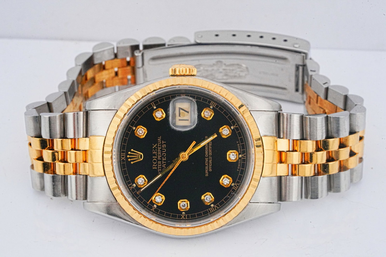 Rolex Datejust 36mm Two-Tone Vintage Watch Ref. 16233: Rolex Oyster Perpetual Datejust 36mm 18K Yellow Gold and Stainless Steel Vintage Watch W/Custom Diamond Dial (Ref. 16233) - This classic Rolex Datejust is crafted in stainless steel with an 18K yellow