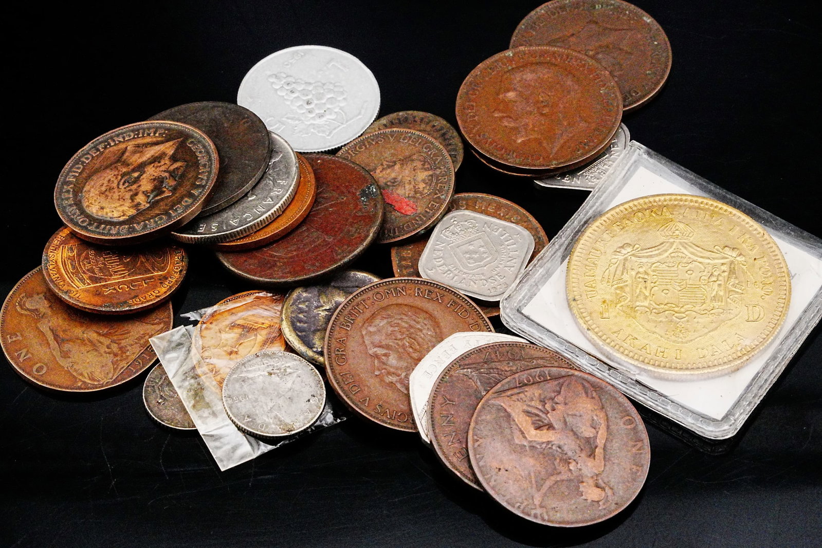 Unsearched Lot of World Coins, Tokens and More: Unsearched Lot of World Coins, Miscellaneous Tokens and More - An exciting assortment for collectors, treasure hunters, and world coin enthusiasts, this unsearched lot features a diverse accumulation 