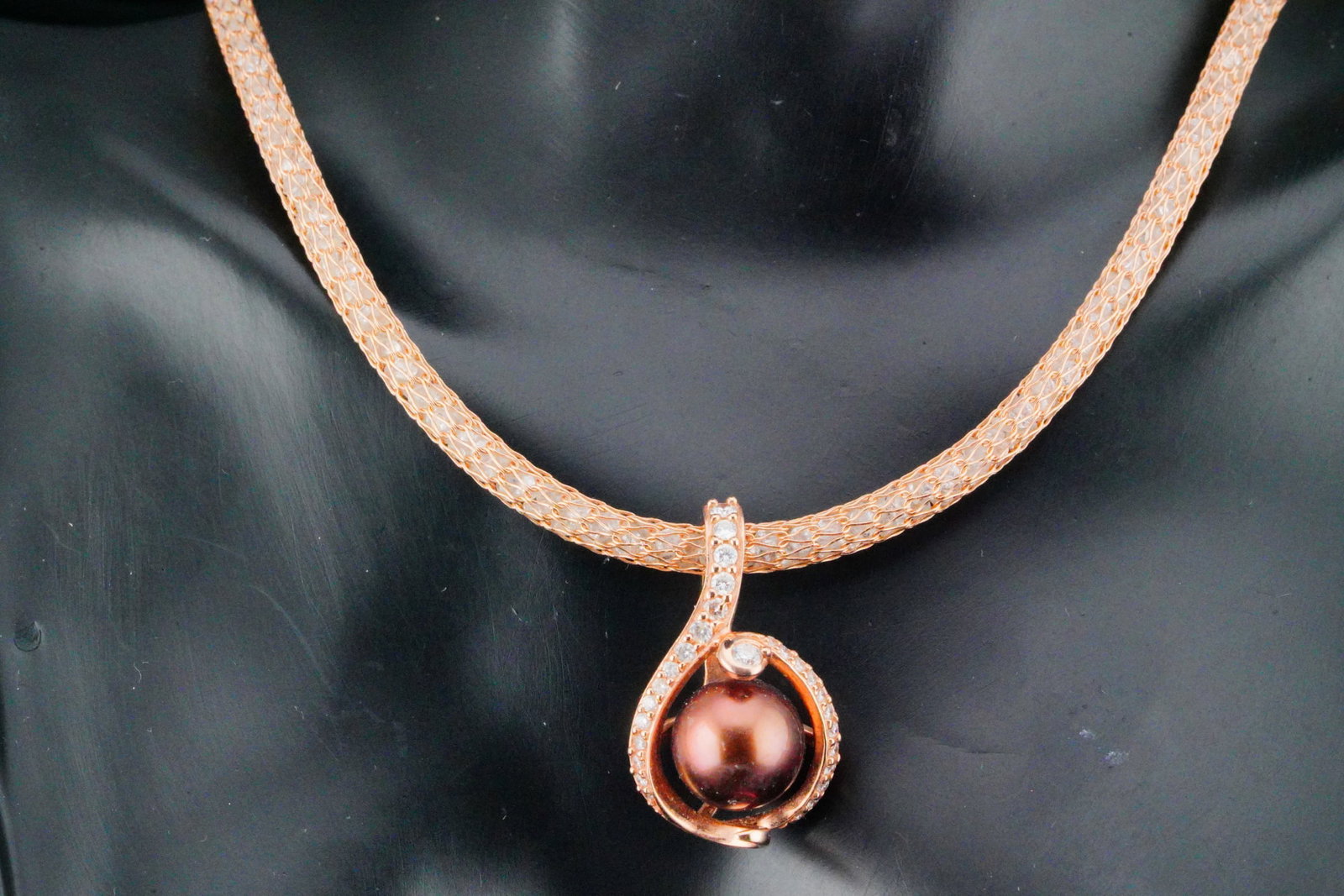 10mm Tahitian Pearl, 0.51ctw Diamond and 14K Necklace: Na Hoku 10mm Chocolate Tahitian Pearl, 0.51ctw VS2-SI1/G-H Diamond and 14K Rose Gold 18" Necklace - This elegant Na Hoku designer necklace showcases a captivating combination of warm 14k rose gold, sp