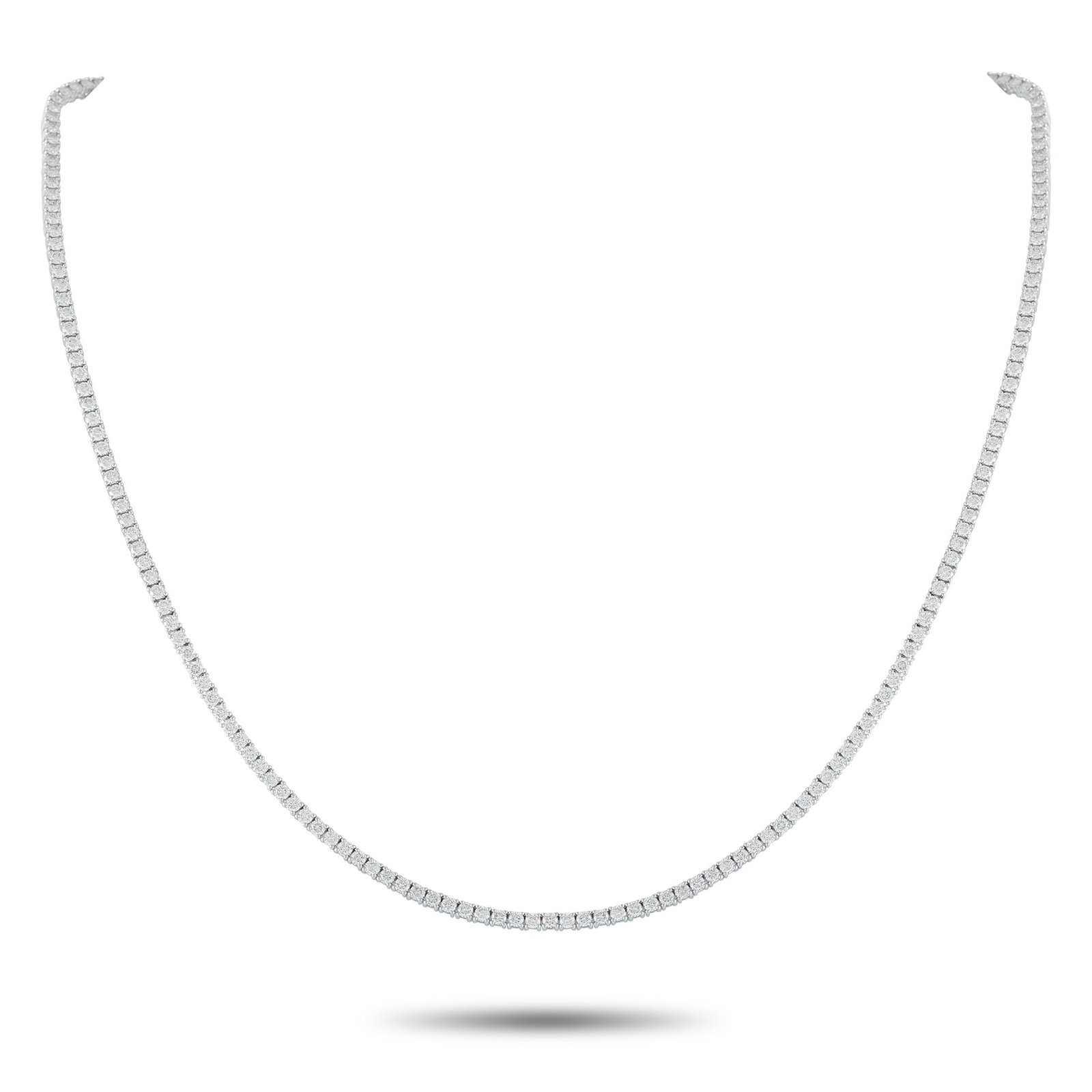 5.90ctw Diamond and 18K White Gold Tennis Necklace: 5.90ctw VS2-SI1/G-H Diamond and 18K White Gold 17.25" Tennis Necklace - THIS ITEM WILL COME WITH A $17,000 INSURANCE VALUATION REPORT. Timeless, elegant, and effortlessly versatile, this classic tenni