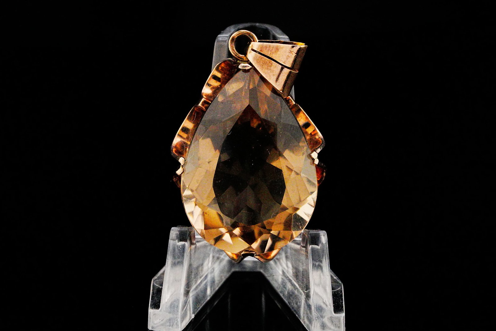 Vintage 26.00ct Smoky Quartz and 14K 1.75" Pendant: Vintage 26.00ct Smoky Quartz and 14K Yellow Gold 1.75" Pendant - Showcasing understated elegance, this vintage pendant features a richly colored smoky quartz weighing approximately 26.00 carats. The w