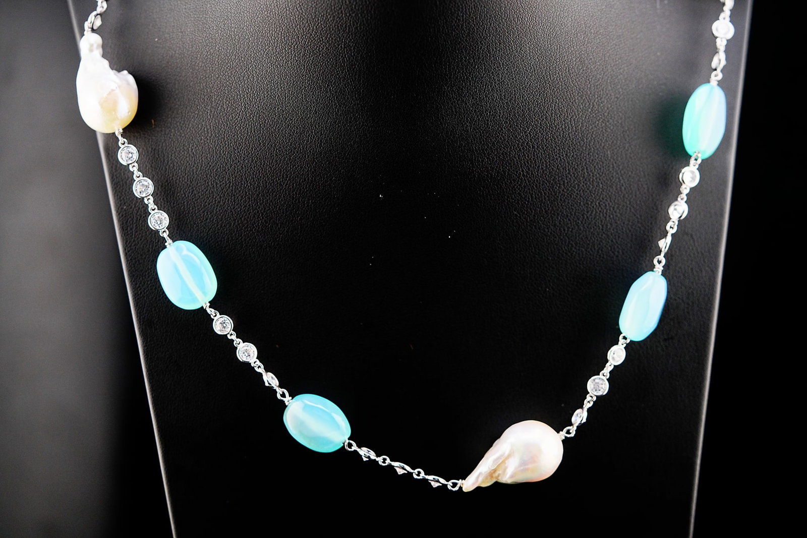 Sterling, 17mm-20mm Pearl, Chalcedony 44" Necklace: Sterling Silver, 21mm-25mm Baroque Pearl, Blue Chalcedony and Crystal 44" Sautoir Necklace - Weight: 107.5 grams. Auction Note: The buyer of this lot will receive an appreciation letter from Prince Lo