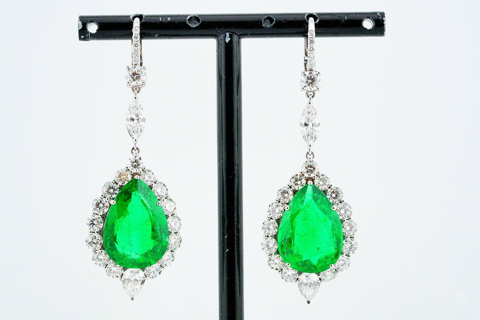 17.75ctw GIA Emerald, 6.70ctw Diamond and 18K Earrings: 17.75ctw GIA Certified Zambian Emerald, 6.70ctw VS1-SI1/G-H Diamond and 18K White Gold 2" Dangle Earrings - A breathtaking pair of dangle earrings, exquisitely crafted in 18K white gold and centered b