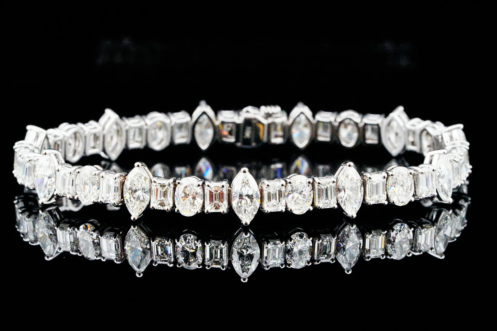 15.75ctw Diamond and 18K White Gold 7" Bracelet: 15.75ctw VS1-SI1/G-H Diamond and 18K White Gold 7" Bracelet - A masterful showcase of exceptional diamond craftsmanship, this magnificent bracelet is expertly fashioned in polished 18K white gold and 