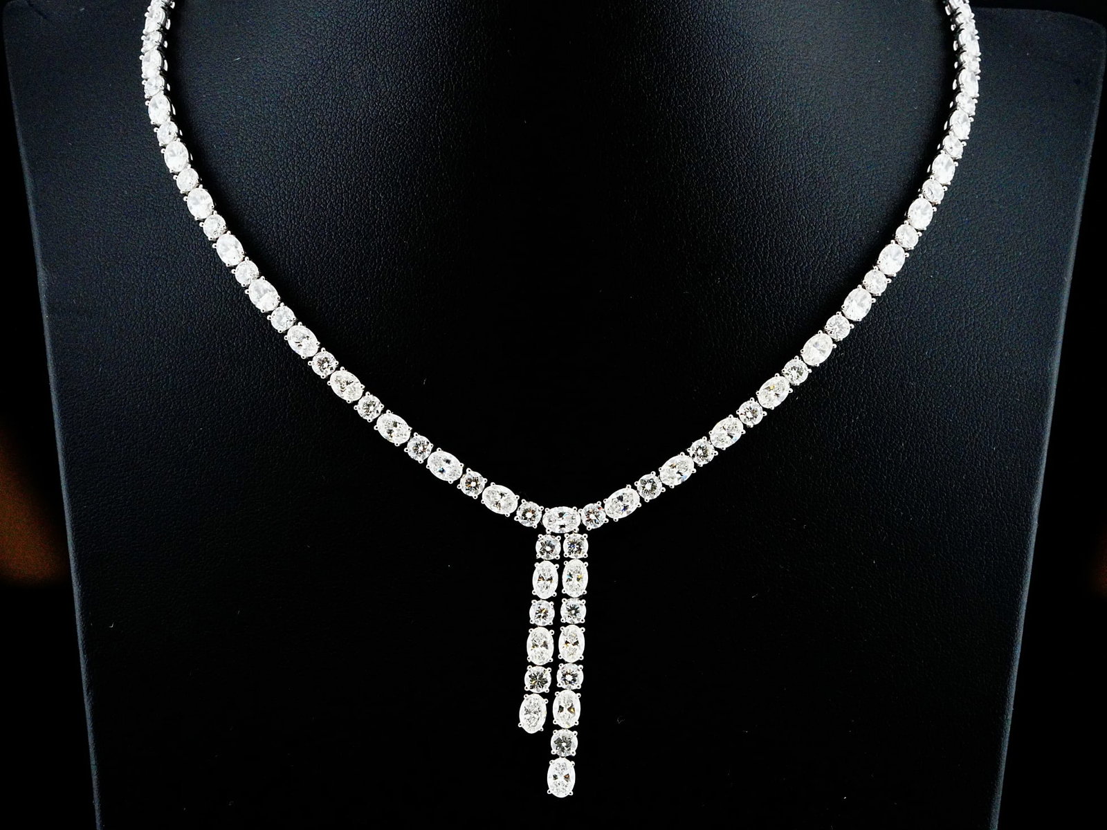 25.10ctw Diamond and 18K White Gold 15" Necklace: 25.10ctw VS1-SI1/G-H Diamond and 18K White Gold 15" Tassel Drop Necklace - Exquisitely crafted in 18K white gold, this sophisticated necklace showcases approximately 25.10 carats total weight of diamo