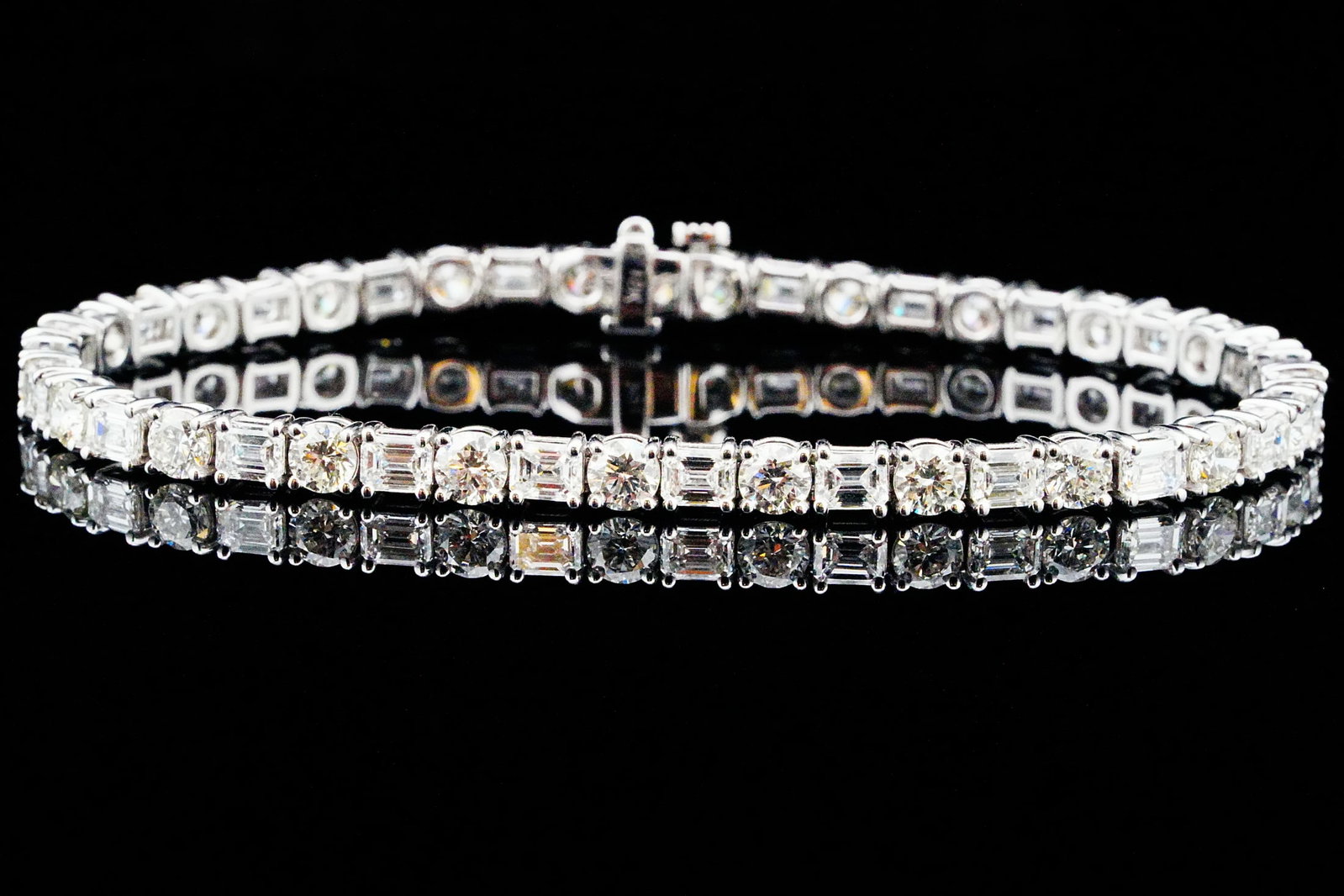 8.40ctw Diamond and 18K White Gold 6.75" Bracelet: 8.40ctw VS1-SI1/G-H Diamond and 18K White Gold 6.75" Bracelet - Showcasing timeless sophistication and exceptional brilliance, this elegant bracelet is crafted in polished 18K white gold and features 