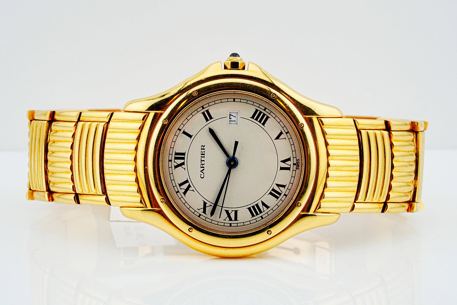 Cartier Cougar 33mm 18K Yellow Gold Watch Ref. 887904: Cartier Cougar 33mm Solid 18K Yellow Gold Quartz Watch W/Integrated 18K Yellow Gold Bracelet Ref. 887904 - An exceptional vintage Cartier Cougar distinguished by its bold architectural silhouette, sub