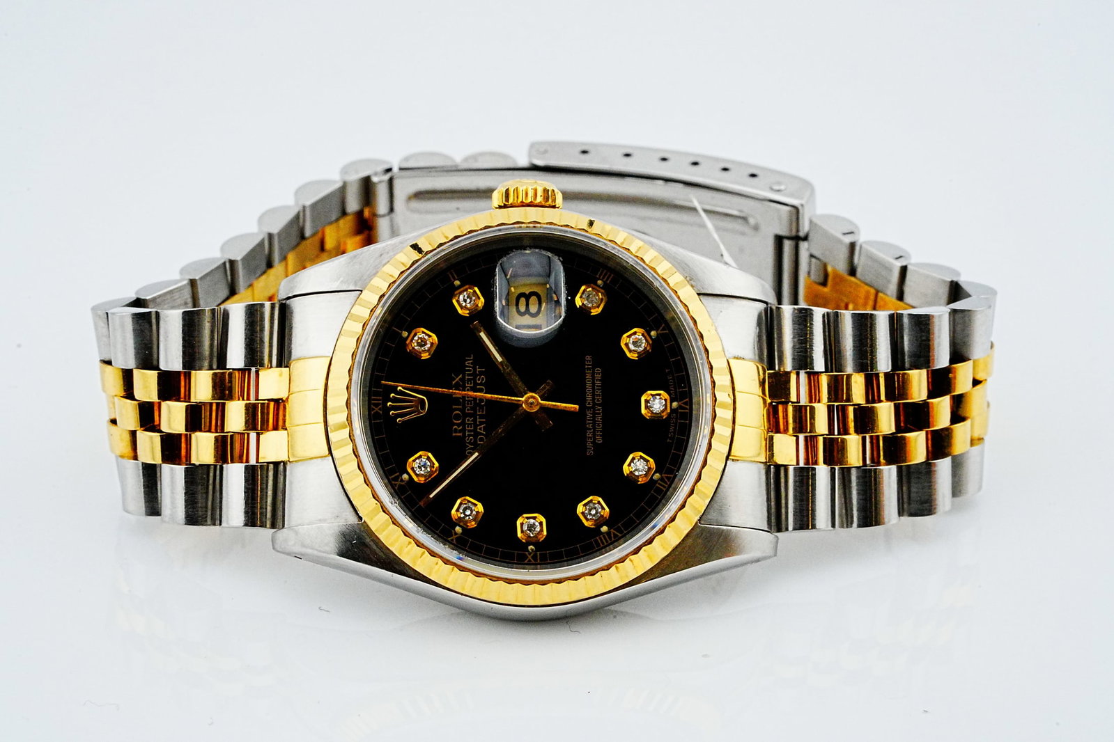 Rolex Datejust 36mm Two-Tone Watch W/Custom Diamond Dial: Rolex Vintage Datejust 36mm Stainless Steel and 18K Yellow Gold Watch W/Custom Diamond-Set Black Dial, Ref. 16233 - This elegant Rolex Datejust showcases the enduring sophistication of the iconic 36mm