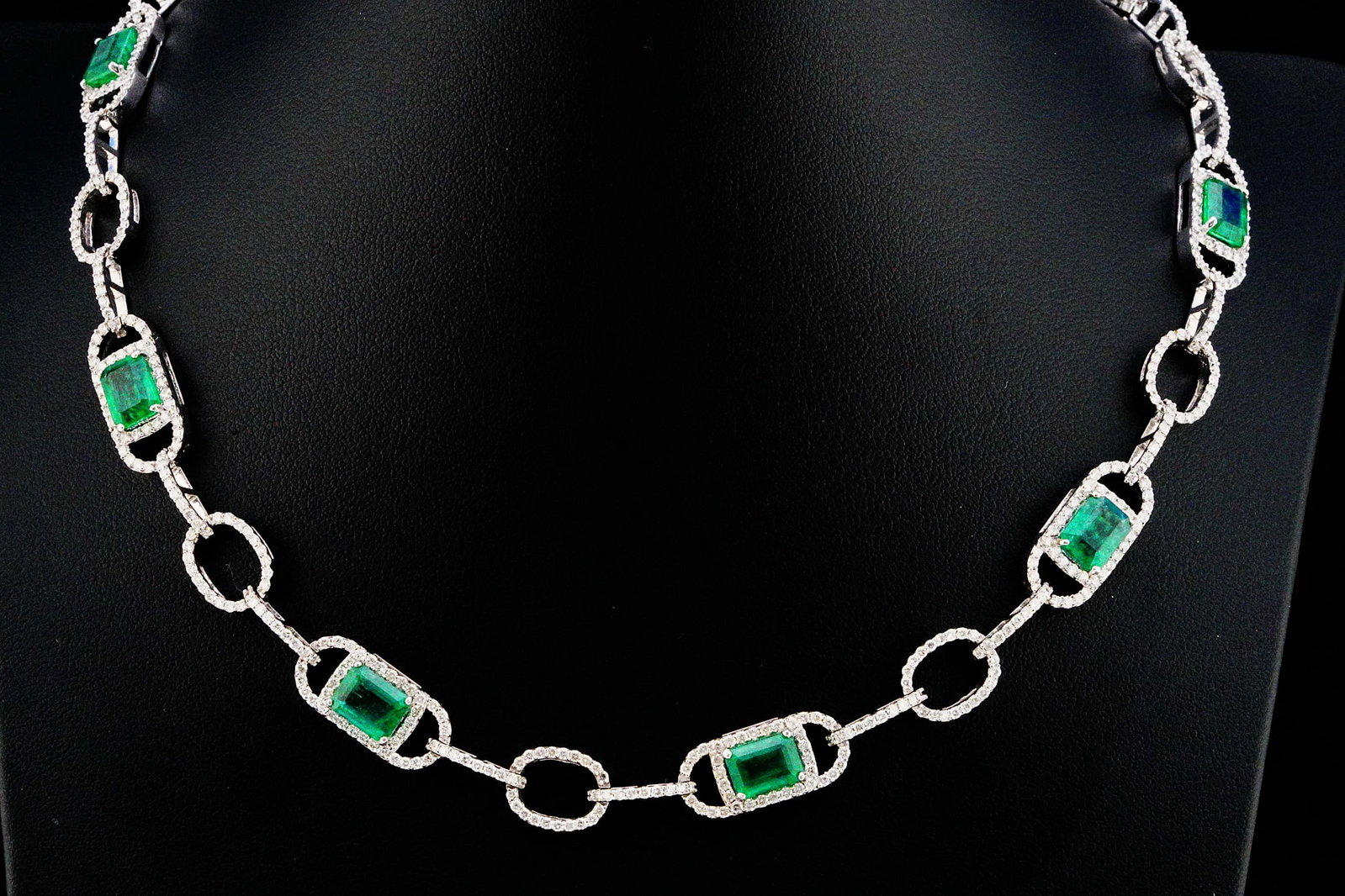 10.15ctw Emerald, 5.90ctw Diamond and 18K 17" Necklace: 10.15ctw Emerald, 5.90ctw VS1-SI1/G-H Diamond and 18K White Gold 17" Open Link Necklace - THIS ITEM WILL COME WITH A $40,000 INSURANCE VALUATION REPORT. An exceptional contemporary statement piece, th