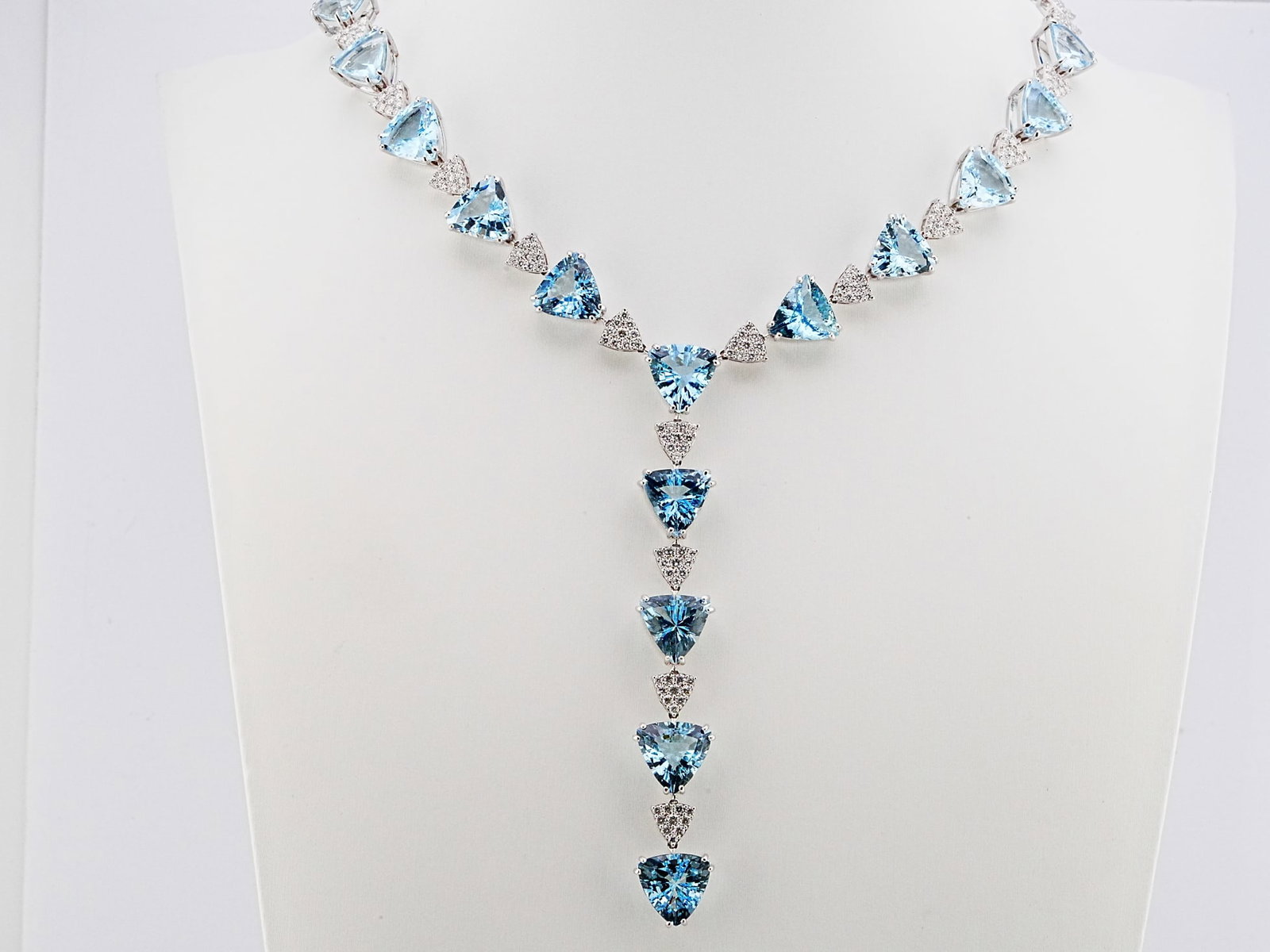 56.90ctw Aquamarine, 7.85ctw Diamond and 18K Necklace: 56.90ctw Aquamarine, 7.85ctw VS1-SI1/G-H Diamond and 18K White Gold 16" Drop Pendant Necklace - THIS ITEM WILL COME WITH A $123,000 INSURANCE VALUATION REPORT. A breathtaking expression of modern