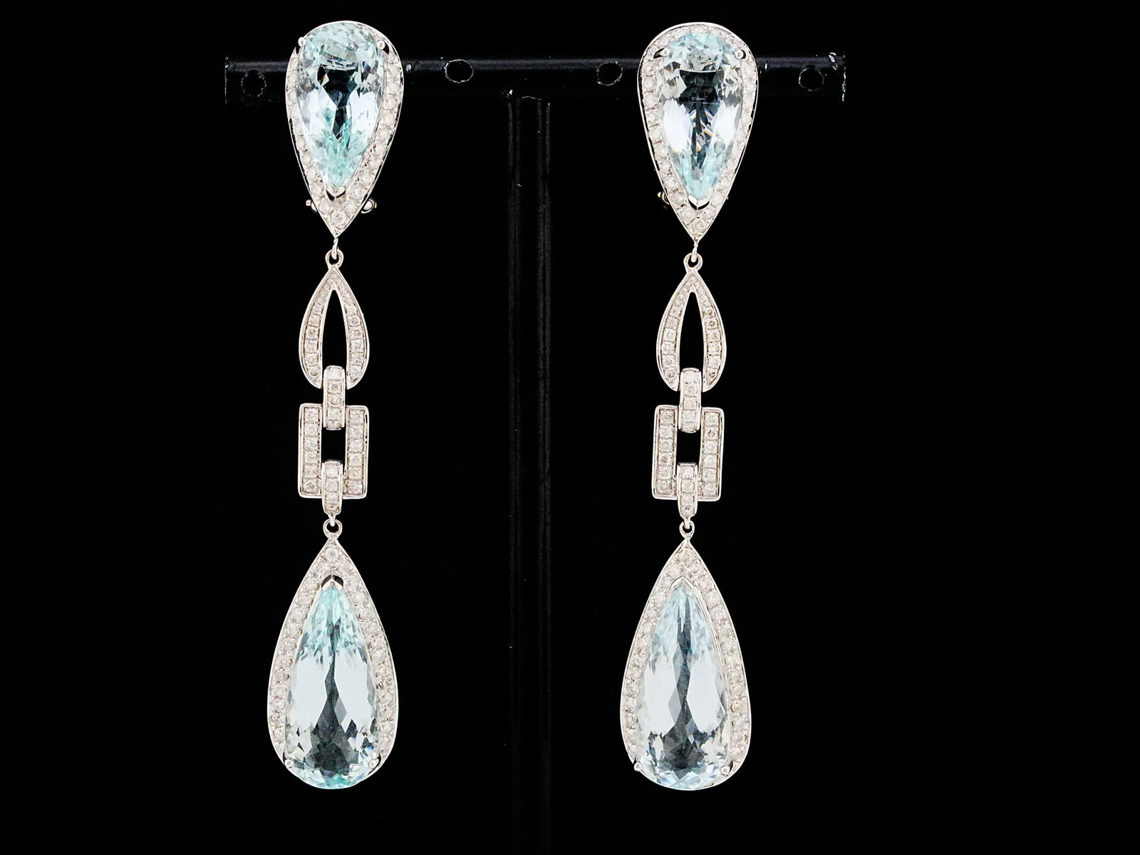22.00ctw Aquamarine, 2.00ctw Diamond and 18K Earrings: 22.00ctw Aquamarine, 2.00ctw VS2-SI2/G-H Diamond and 18K White Gold 3" Geometric Dangle Earrings - THIS ITEM WILL COME WITH A $23,500 INSURANCE VALUATION REPORT. A striking statement of modern eleganc