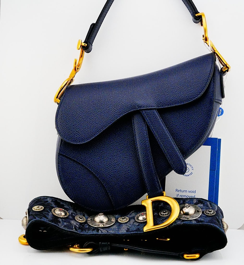 Dior Navy Calfskin Mini Saddle Bag W/Jacquard Strap: Dior Navy Grained Calfskin Mini Saddle Bag W/Studded Jacquard Strap - A timeless expression of Dior's celebrated craftsmanship, this Dior Mini Saddle Bag is rendered in elegant navy grained calfskin l