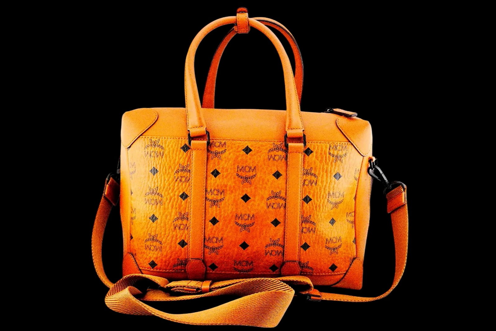 MCM Visetos Monogram Canvas Shoulder Bag: MCM Visetos Monogram Canvas Shoulder Bag - A bold and travel-inspired design from MCM, this Visetos monogram canvas messenger bag reflects the house's heritage in luxury luggage, embodying a spirit of