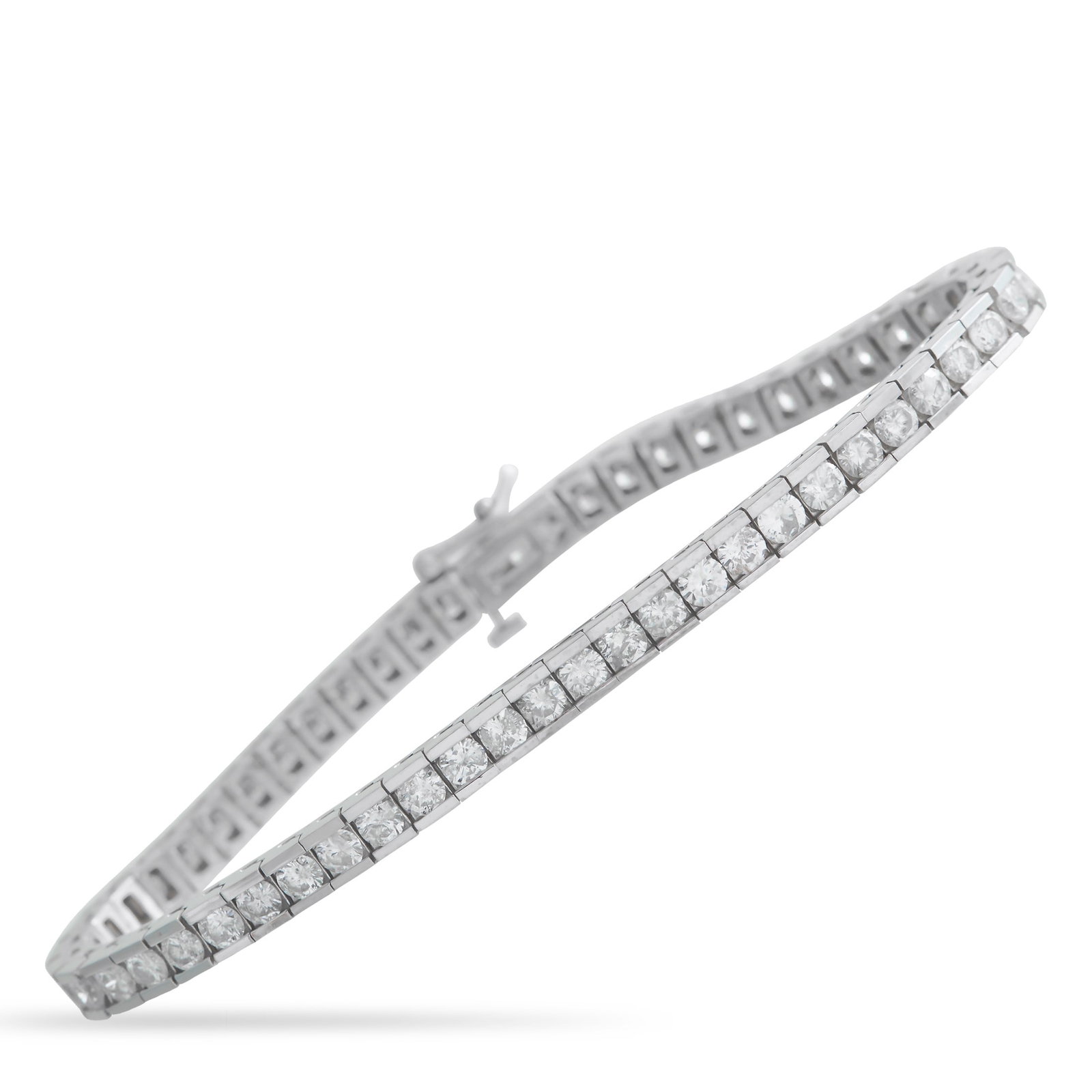 5.60ctw Diamond and 14K White Gold 7" Bracelet: 5.60ctw SI1-SI2/G-H Diamond and 14K White Gold 7" Bracelet - Channel set Diamonds with a total weight of approximately 5.60 carats make this tennis bracelet incredibly elegant. Sleek and stylish, the 