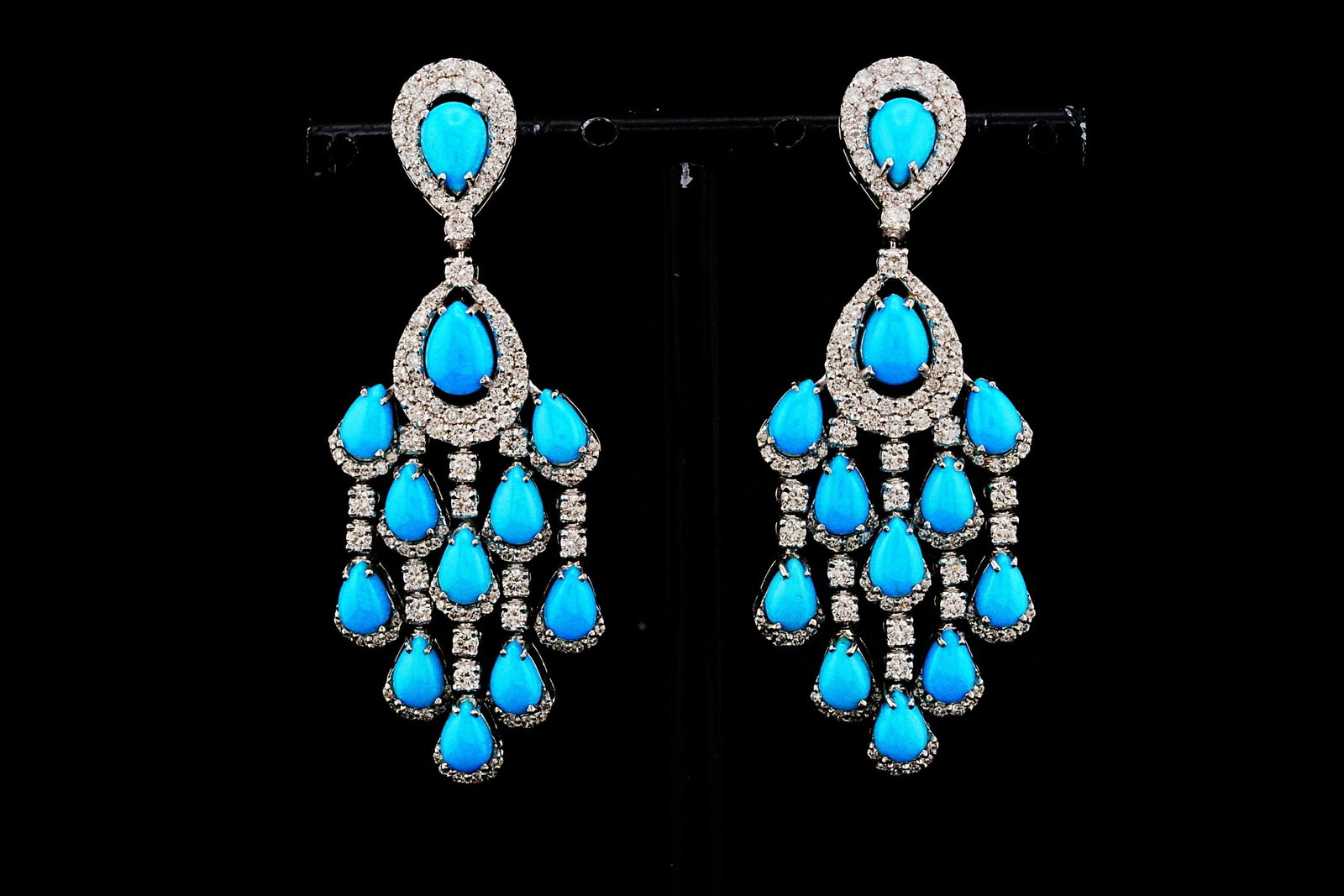 10.00ctw Turquoise, 2.80ctw Diamond and 18K Earrings: 10.00ctw Turquoise, 2.80ctw VS1-SI1/G-H Diamond and 18K White Gold 2.25" Chandelier Earrings - THIS ITEM WILL COME WITH A $25,000 INSURANCE VALUATION REPORT. Showcasing approximately 10.00 carats tota