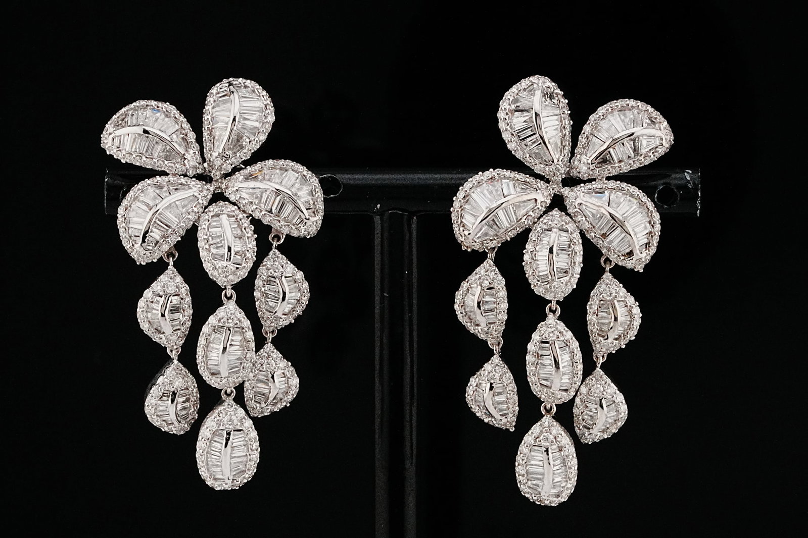 5.20ctw VS2-SI1/G-H Diamond and 18K 1.75" Earrings: 5.20ctw VS2-SI1/G-H Diamond and 18K White Gold 1.75" Floral Fringe Drop Earrings - THIS ITEM WILL COME WITH A $29,500 INSURANCE VALUATION REPORT. A dazzling expression of refined glamour, these except