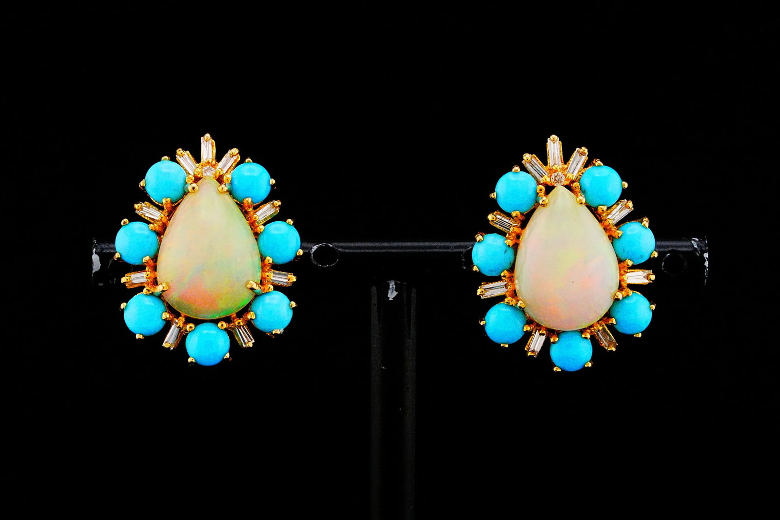 6.15ctw Opal, 3.90ctw Turquoise, Diamond, 14K Earrings: 6.15ctw Opal, 3.90ctw Turquoise, 0.35ctw Diamond and 14K Yellow Gold 0.90" Earrings - THIS ITEM WILL COME WITH AN $8,000 INSURANCE VALUATION REPORT. A vibrant celebration of color and timeless eleganc