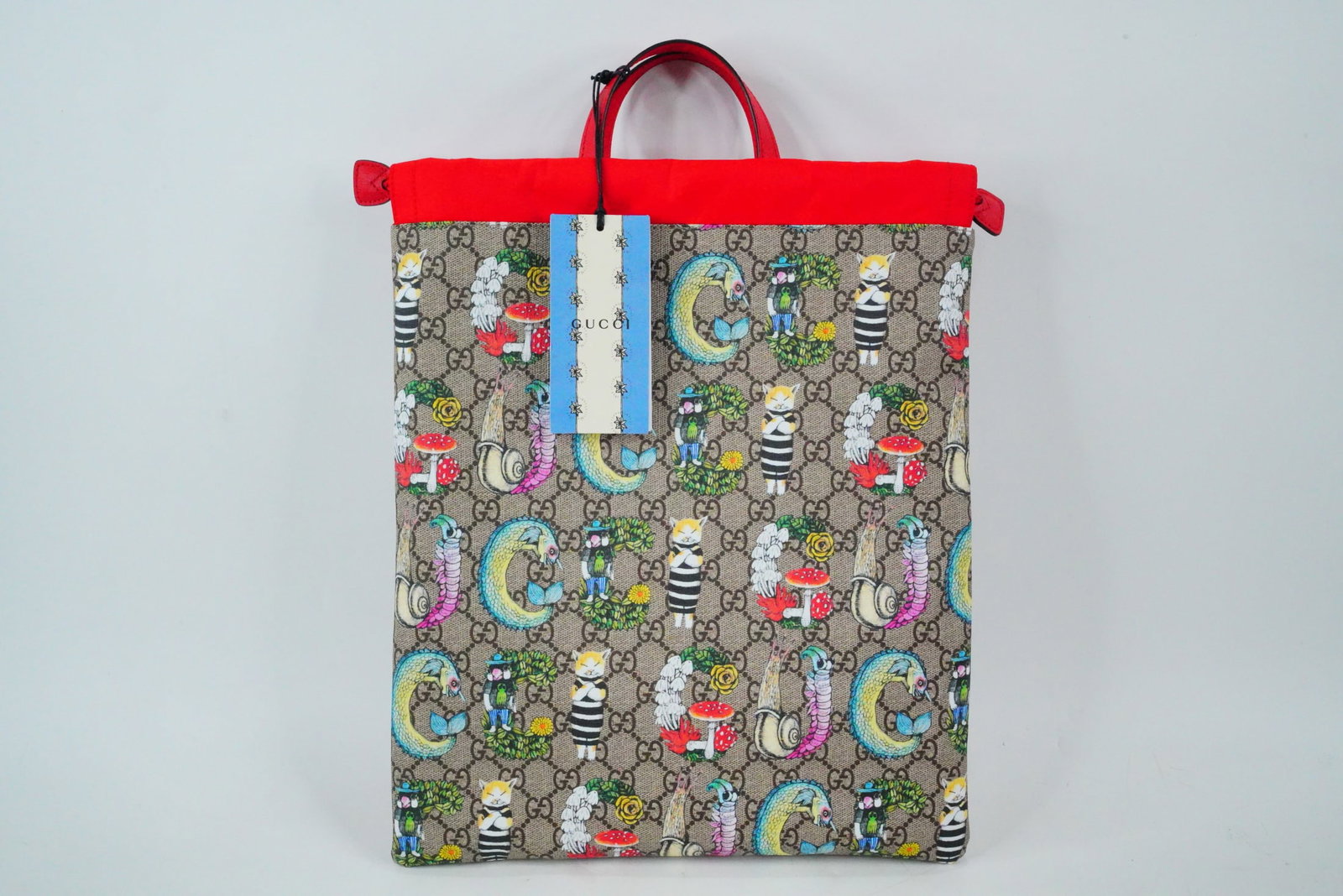 Gucci x Higuchi Yuko Animal GG Drawstring Backpack: Gucci x Higuchi Yuko S/S 2020 Limited Edition Animal Print GG Supreme Drawstring Backpack Never Used W/Dust Cover and Box (Sold Out) - GUARANTEED AUTHENTIC. Step into the whimsical world of Japanese a