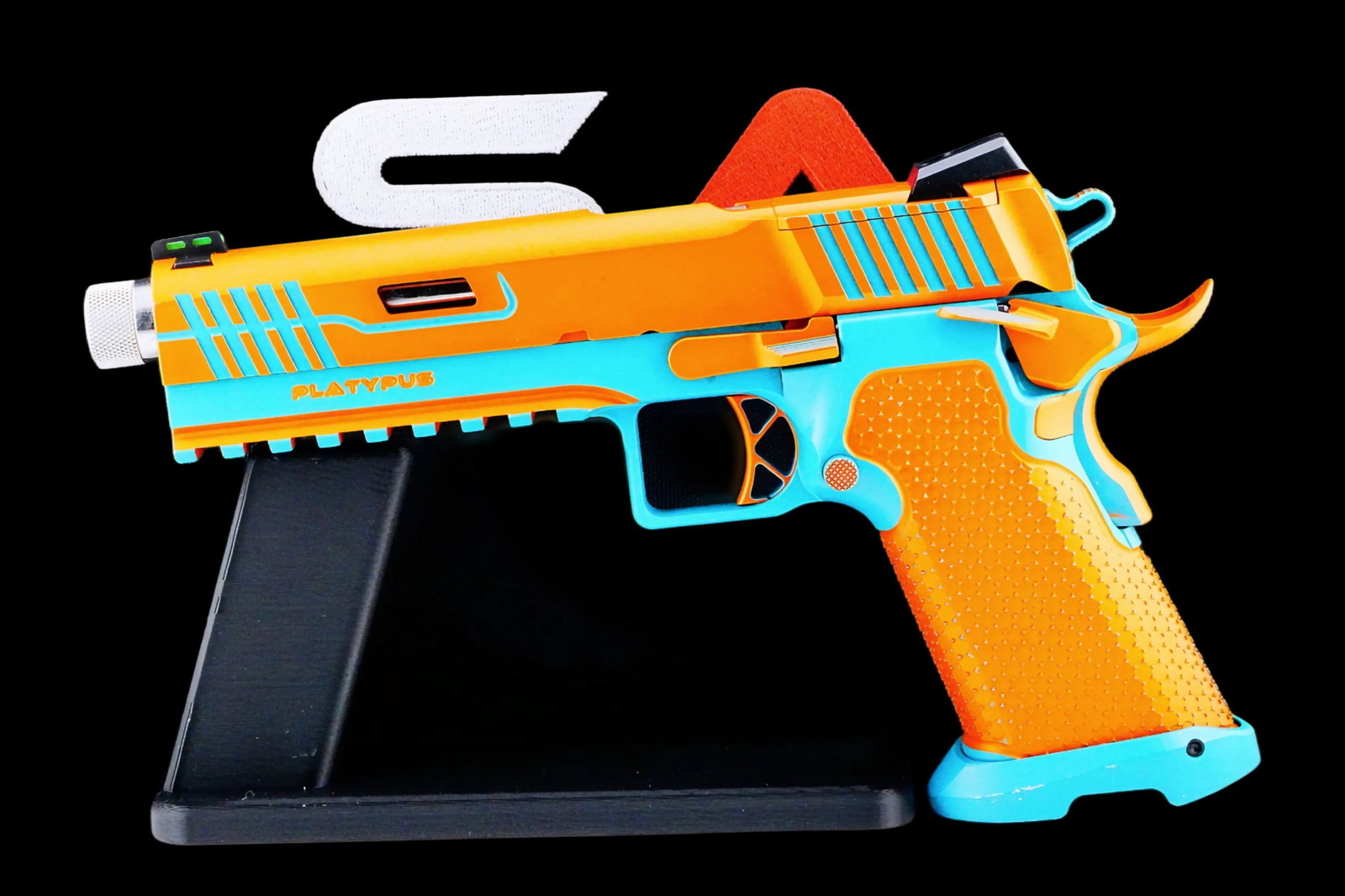 Stealth Arms 1911 Platypus "The Perry" Turquoise/Orange: Stealth Arms 1911 Platypus "The Perry", chambered in 9mm and featuring an eye-catching custom turquoise and orange finish. This fully customized double-stack pistol combines the familiar design and