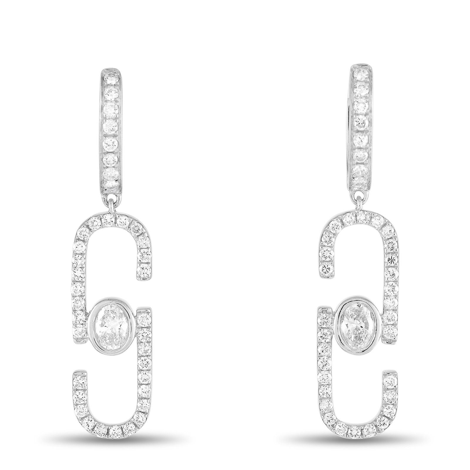 1.40ctw Diamond and 18K White Gold 1.50" Earrings: 1.40ctw SI1-SI2/G-H Diamond and 18K White Gold 1.50" Dangle Earrings - These sophisticated dangle earrings showcase an artistic, elongated design crafted in 18K white gold and illuminated by approxima