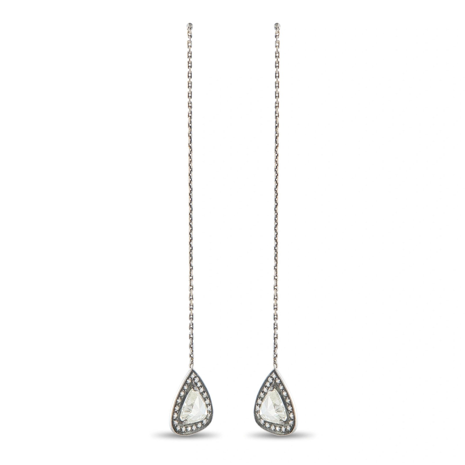 3.20ctw Diamond and 14K White Gold Long Drop Earrings: 3.20ctw Diamond and 14K White Gold 3.25" Long Drop Earrings - These elegant long drop earrings showcase a graceful cascading design in 14K white gold. Each earring suspends a pear-shaped halo pendant 