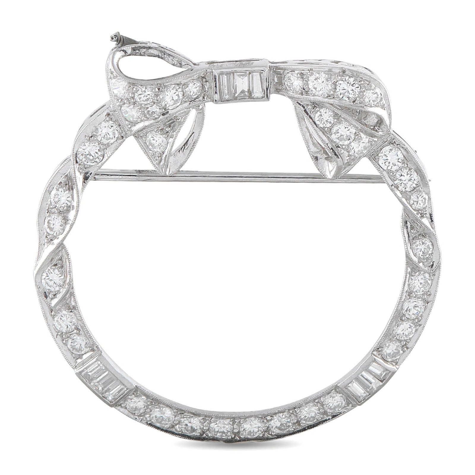 1.30ctw Diamond and Platinum 1.50" Circular Bow Brooch: 1.30ctw VS2-SI1/G-H Diamond and Platinum 1.50" Circular Bow Brooch - This charming brooch showcases an elegant circular silhouette crafted in platinum, defined by graceful ribbon-like forms that