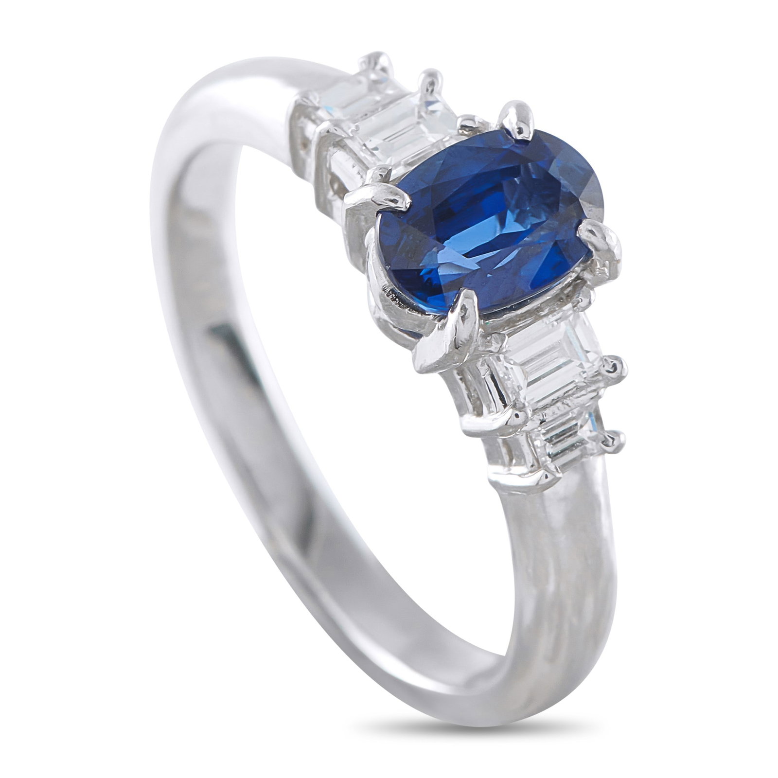 1.10ct Blue Sapphire, 0.30ctw Diamond and Platinum Ring: 1.10ct Blue Sapphire, 0.30ctw Diamond and Platinum Ring - Refined and timeless, this platinum ring centers on an approximately 1.10-carat oval blue sapphire secured in a classic four-prong setting.
