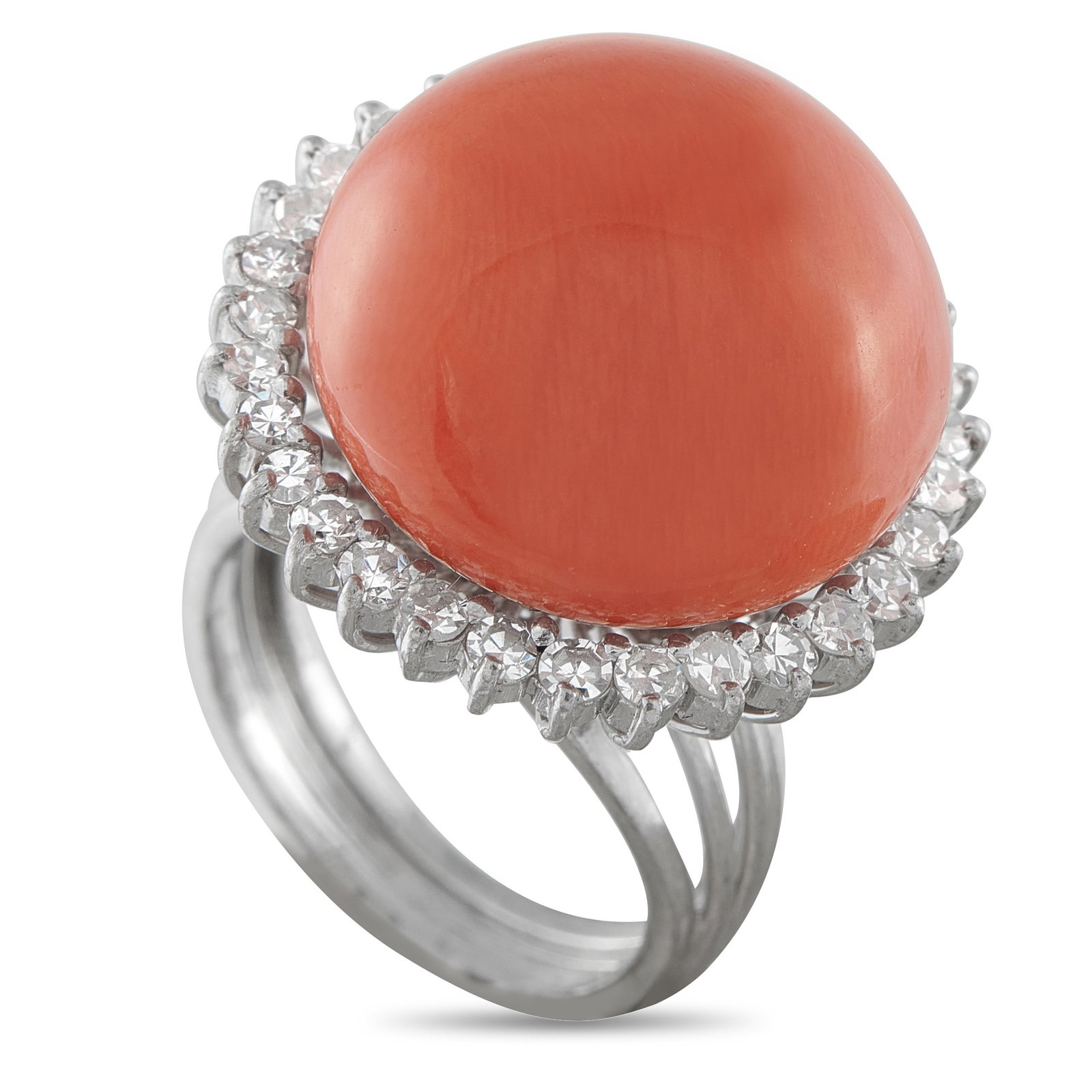 18.7mm Coral, 0.65ctw Diamond and 18K White Gold Ring: 18.7mm Coral, 0.65ctw Diamond and 18K White Gold Ring - A striking 18.7mm coral cabochon commands attention at the center of this sophisticated cocktail ring, showcasing the natural beauty and rich co