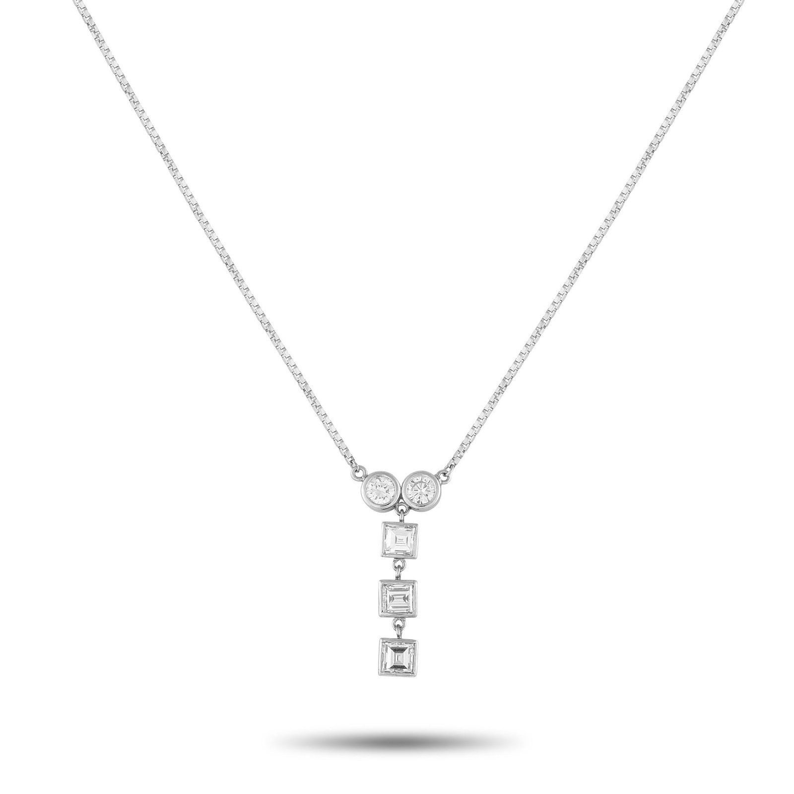 1.40ctw Diamond and Platinum Necklace: 1.40ctw VS2-SI1/G-H Diamond and Platinum Necklace - Sleek and modern, this necklace pairs geometric precision with refined sparkle. The pendant begins with two bezel-set round diamonds, their brillian
