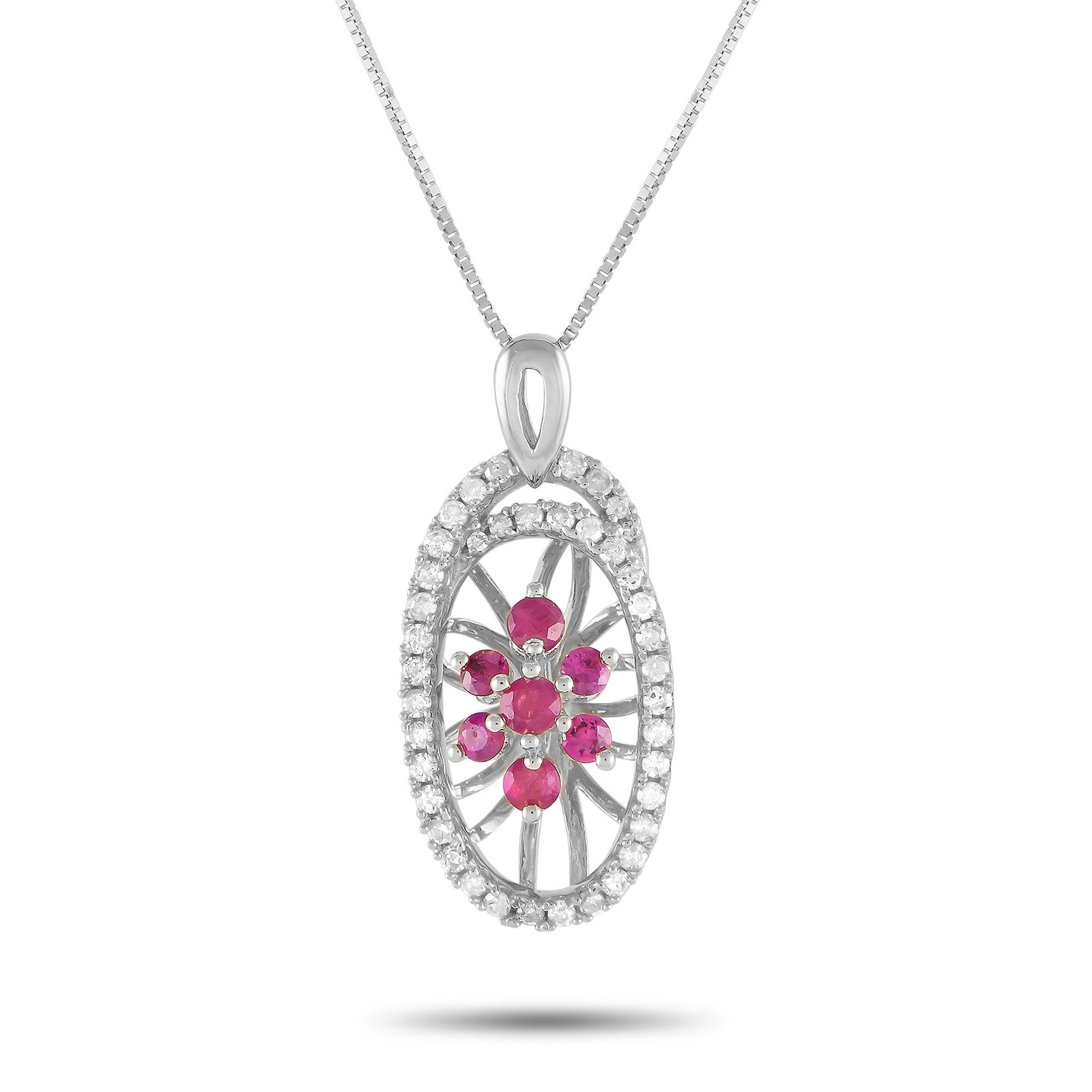 14K White Gold, 0.20ctw Diamond and Ruby Necklace: 14K White Gold, 0.20ctw Diamond and Ruby 18" Necklace - This luxury necklace will continually capture your imagination. Suspended from an 18" box chain, you'll find an intricate 14K white gold pendant