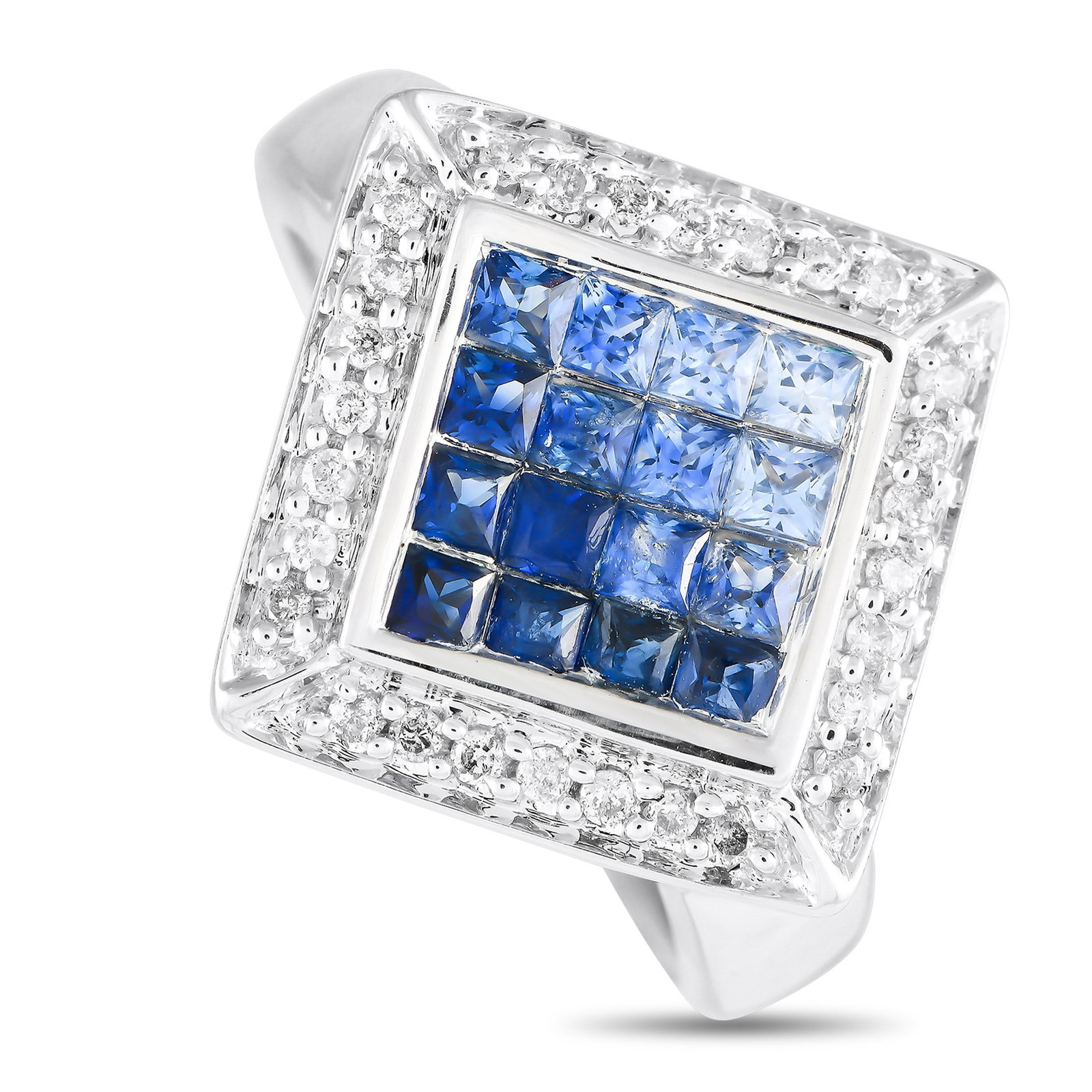 1.05ctw Blue Sapphire, 0.20ctw Diamond and 14K Ring: 1.05ctw Blue Sapphire, 0.20ctw Diamond and 14K White Gold Ring - A captivating arrangement of blue sapphires totaling approximately 1.05 carats creates a striking focal point in this elegant ring. Sur