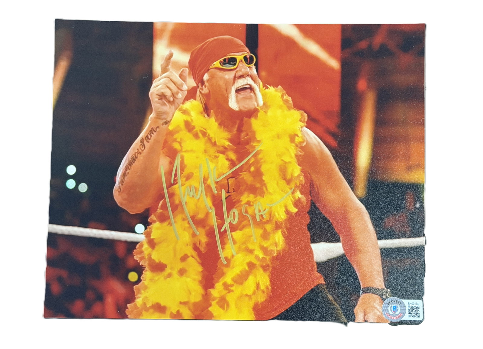 Hulk Hogan Signed 8 x 10-Inch Photo (Beckett): Hulk Hogan Signed 8 x 10-Inch Photo W/Beckett Authentication - A vibrant signed 8 x 10-inch color photograph of wrestling icon Hulk Hogan, captured in one of his unmistakable larger-than-life appearan
