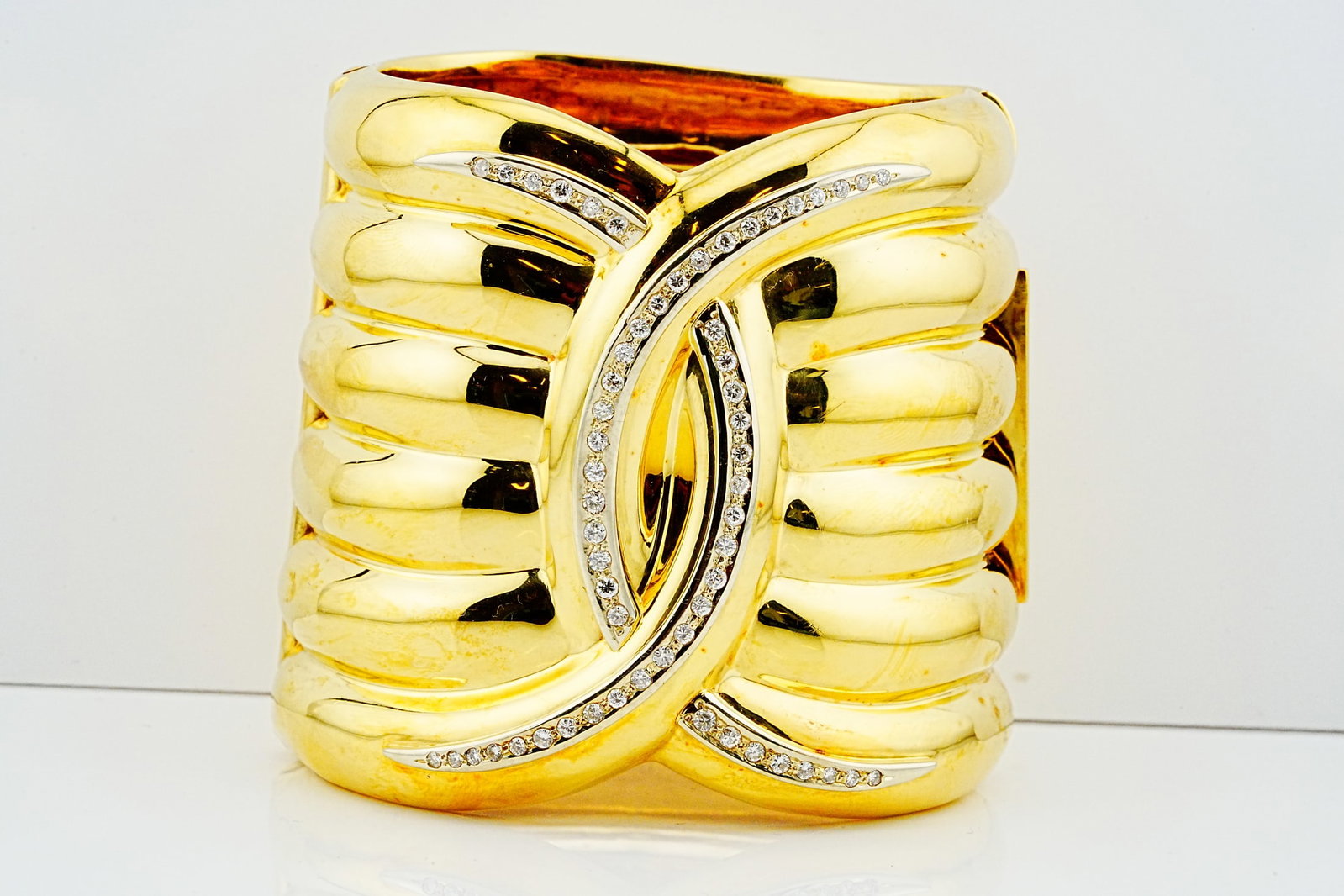 2.00ctw Diamond and Solid 18K Yellow Gold Vintage Cuff: 2.00ctw VS1-SI1/G-H Diamond and Solid 18K Yellow Gold Vintage CC Cuff - A striking vintage cuff showcasing a bold, sculptural design in solid 18K yellow gold, featuring broad, highly polished rounded 