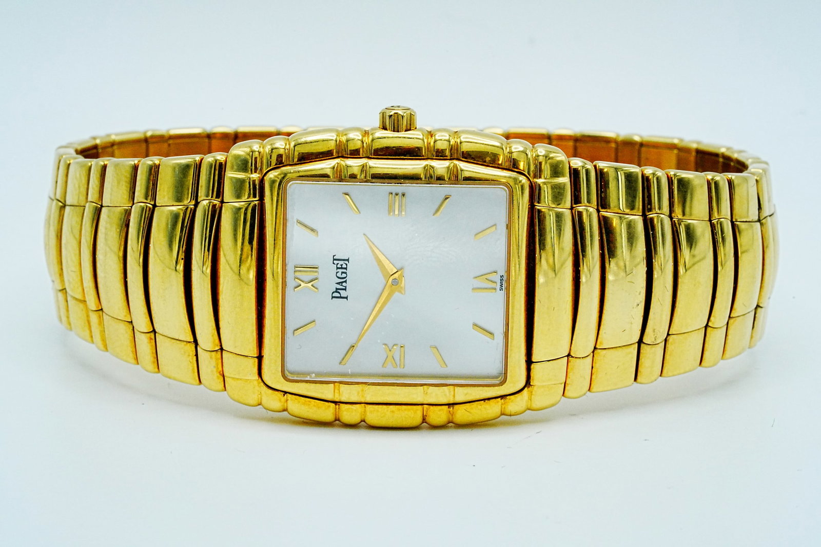 Piaget Tanagra 18K Yellow Gold Watch W/Mother of Pearl Dial: Piaget Tanagra Solid 18K Yellow Gold Watch W/Mother of Pearl Dial Ref. 17061 - Discover the epitome of luxury and sophistication with the Piaget Tanagra watch, a masterful blend of classic elegance