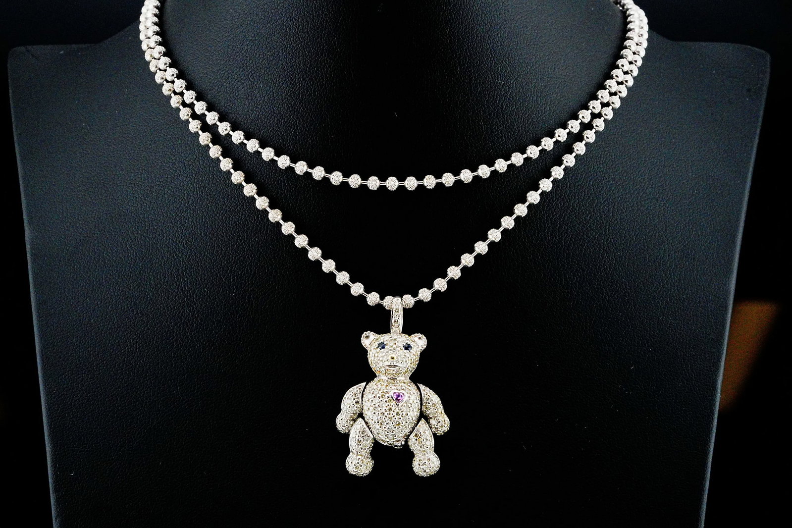 2.00ctw Diamond and 18K/14K Teddy Bear 30" Necklace: 2.00ctw Diamond and 18K White Gold Teddy Bear Pendant/Brooch W/Sapphire Accents on 30" 14K White Gold Chain - Whimsically elegant and expertly crafted in 18K white gold, this exceptional necklace feat