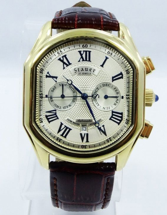 Men's Stauer "Day/Date/Month" Automatic 27J Watch: Men's Stauer "Day/Date/Month" Automatic 27 Jewel Dress Watch W/Glass Back *UNIQUE*-This watch has a sapphire crown, and a large 1.5" face. Estimated retail value: $550-$600