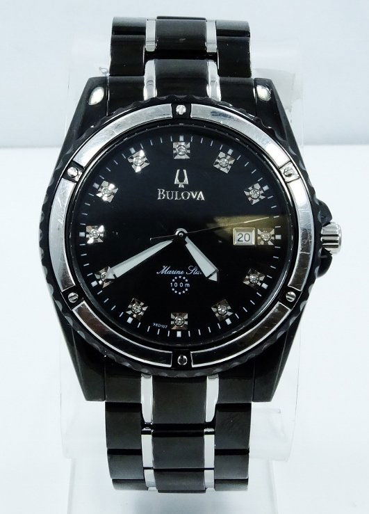 Men's Bulova Marine Star Watch W/Diamonds: Men's Bulova Marine Star Watch W/Genuine Diamond Markers *WORKING*-This watch is made of black stainless steel. The dial also has genuine diamond markers. Estimated retail value: $575-$650