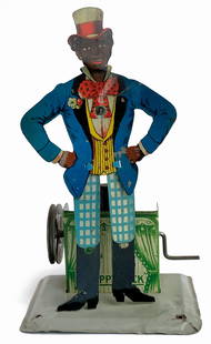 Personaggio Happy Jack: Ditta K W (MÃ¤rklin), Germania, 1925. Altezza cm 15.5, larghezza cm 9. Movimento a manovella con predisposizione puleggia per movimento automatico con altri personaggi. Eccellente stato,