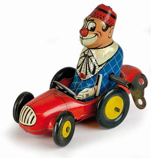 Biller Clowns Clown Bimbo: Auto con personaggio, con funzionamento a molla, prodotto dalla Biller, Germania, primi anni '50. Lunghezza cm 12, altezza cm 8,5. Con marchio Biller al retro. Movimento a molla, con meccanismo