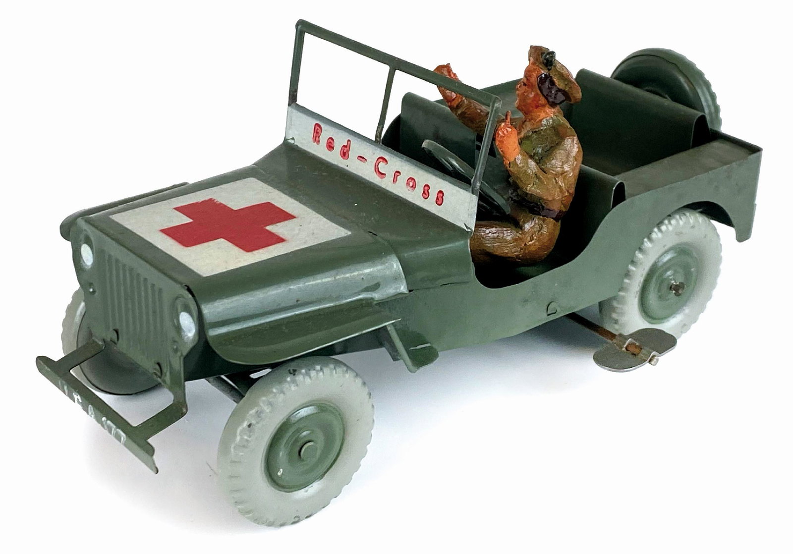 Red Cross - Camion Croce Rossa: Lotto composto da due giocattoli in latta litografata: "Jeep Croce Rossa" ditta M.L.B. (Marchesini), Italia, anni '40. Lunghezza cm 17x8,5. Completo del soldatino in pasta dipinto a mano. Carica a mol