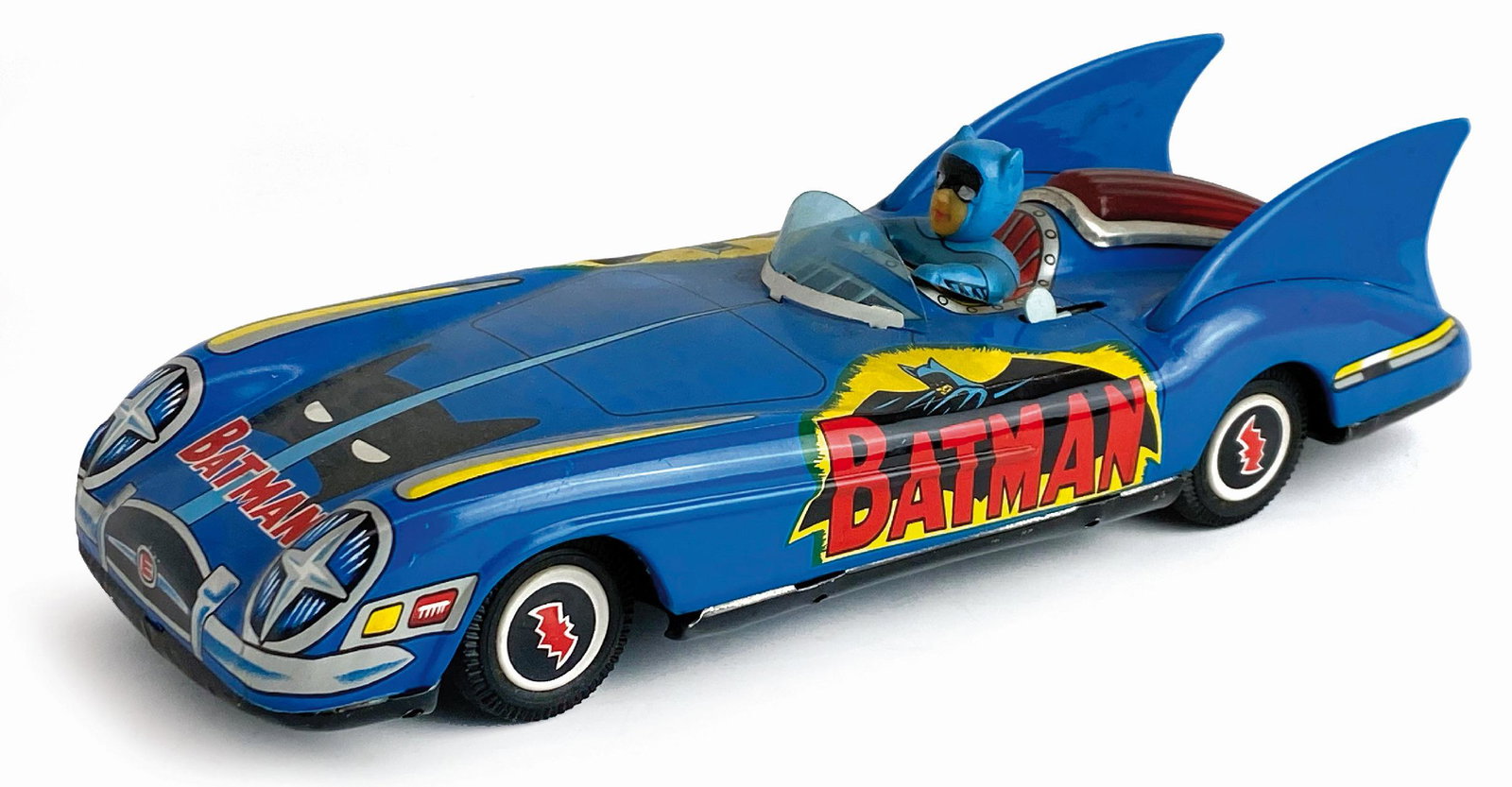 Auto di Batman: Ditta ASC Aoschin, Giappone, 1966. Modello in latta serigrafata e plastica dura. Lunghezza cm 28x8. Funzionamento a batteria con luce motore. Ottime condizioni. ENG Japan, 1966. Hard plastic and litho