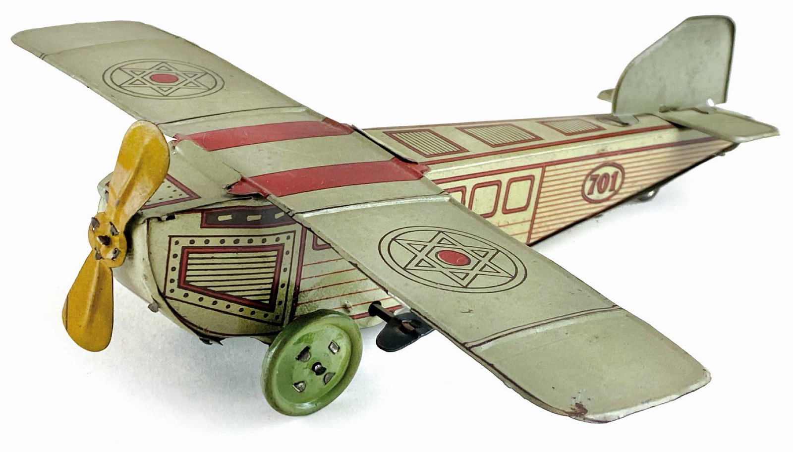 Aeroplano Alemanni n. 701: Ditta Alemanni, Italia, anni '20. Latta litografata. Cm 21,5x22,5x5,5. Funzionamento a molla, elica girevole e chiavetta integrata. Con emblema di stella di David sulle ali, raro, ottimo stato. ENG Di