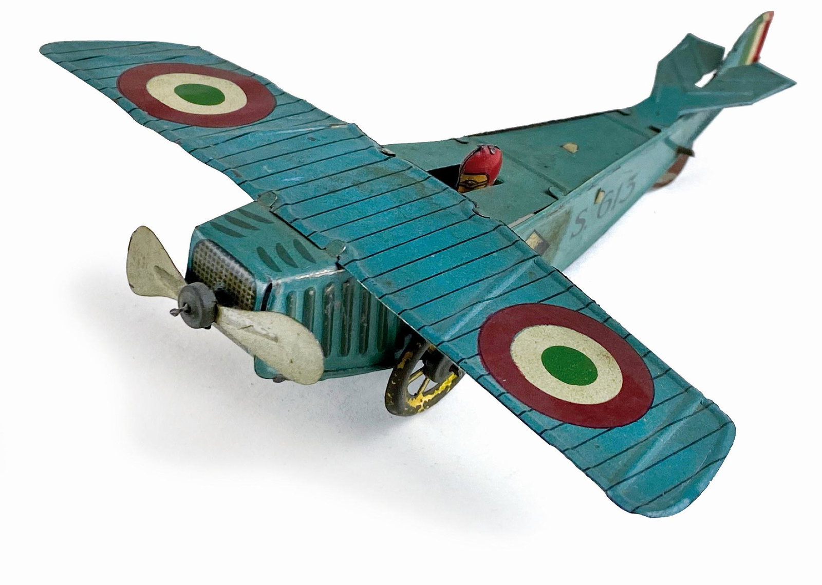 Aeroplano Ingap S. 613: Ditta Ingap, Italia, anni '20. Latta litografata, Cm 15,5x14,5x5. Meccanismo statico funzionante con elica girevole. Funzionante, ottimo stato. ENG Ditta Ingap, 1920s. Lithographed tin model. Cm 15.5x