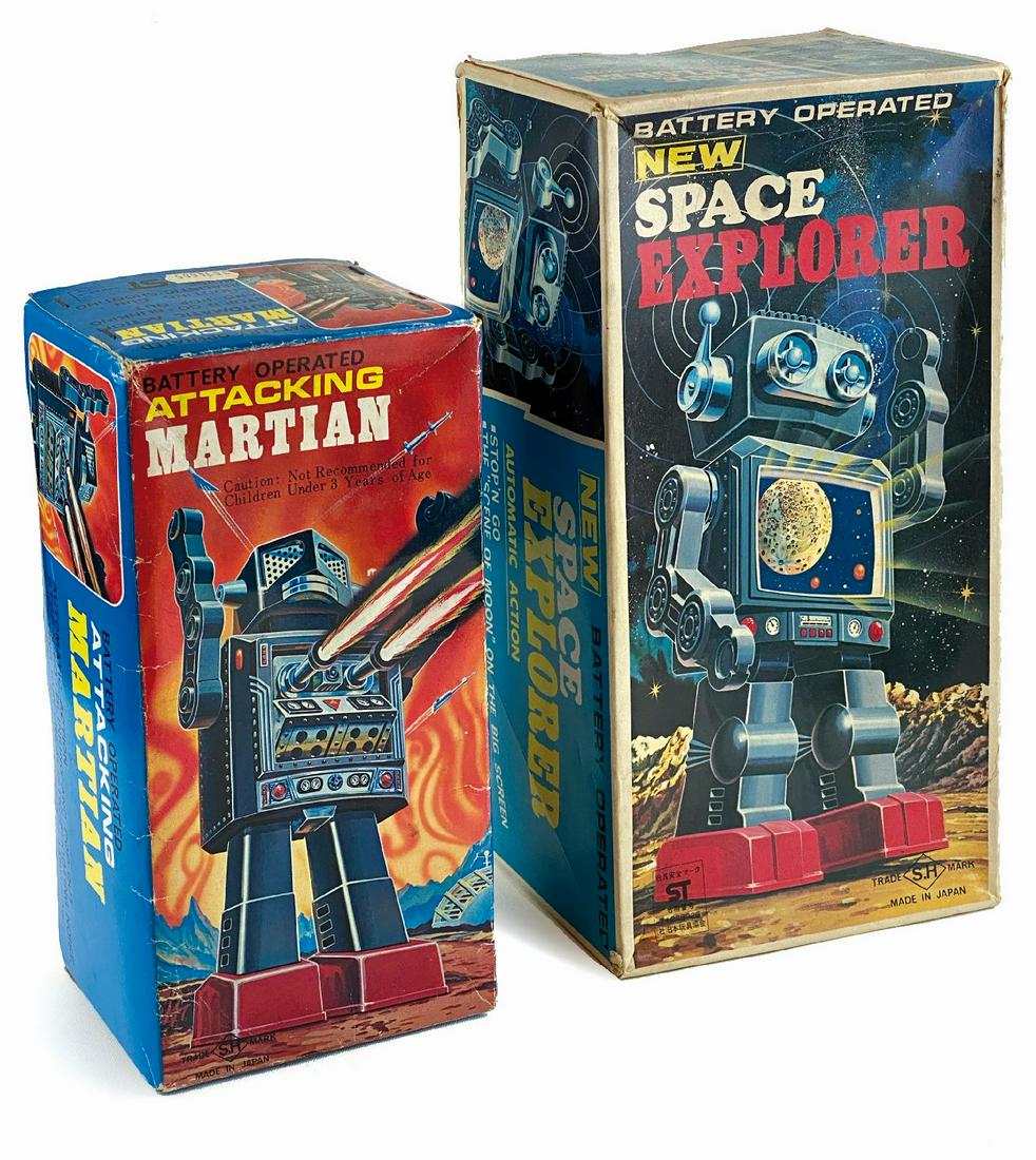 Attacking Martian, New Space Explorer: Coppia di scatole originali di robot giapponesi, anni '60. Attacking Martian cm 25x12,5x10; New Space Explorer cm 31x16x11. Buono stato. ENG Pair of Japanese robots' original boxes, 1960s. Attacking M