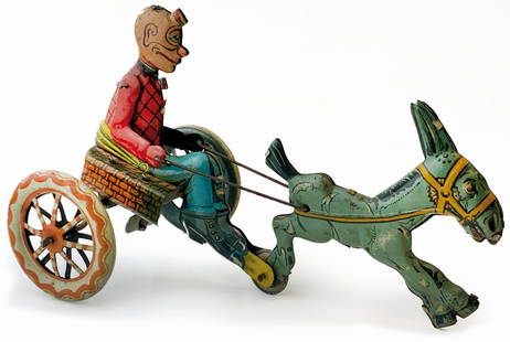 Fortunello in Carrozzella Ingap n. 764: Giocattolo in latta litografata a molla, anni 1928. Funzionante, h cm 11 e lunghezza cm 18. Ottimo stato, litografia ottimamente conservata. ENG Spring lithographed tin toy, 1928. Working, h 11 cm