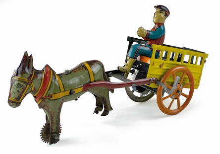 Carretto con mulo Ingap n. 610: Ingap, Italia, 1933. Latta litografata, completo di conducente. Cm 16,5x5,5x8,5. Meccanismo a molla funzionante con chiavetta originale integrata. Buona conservazione. (cfr in “Giocattoli italiani