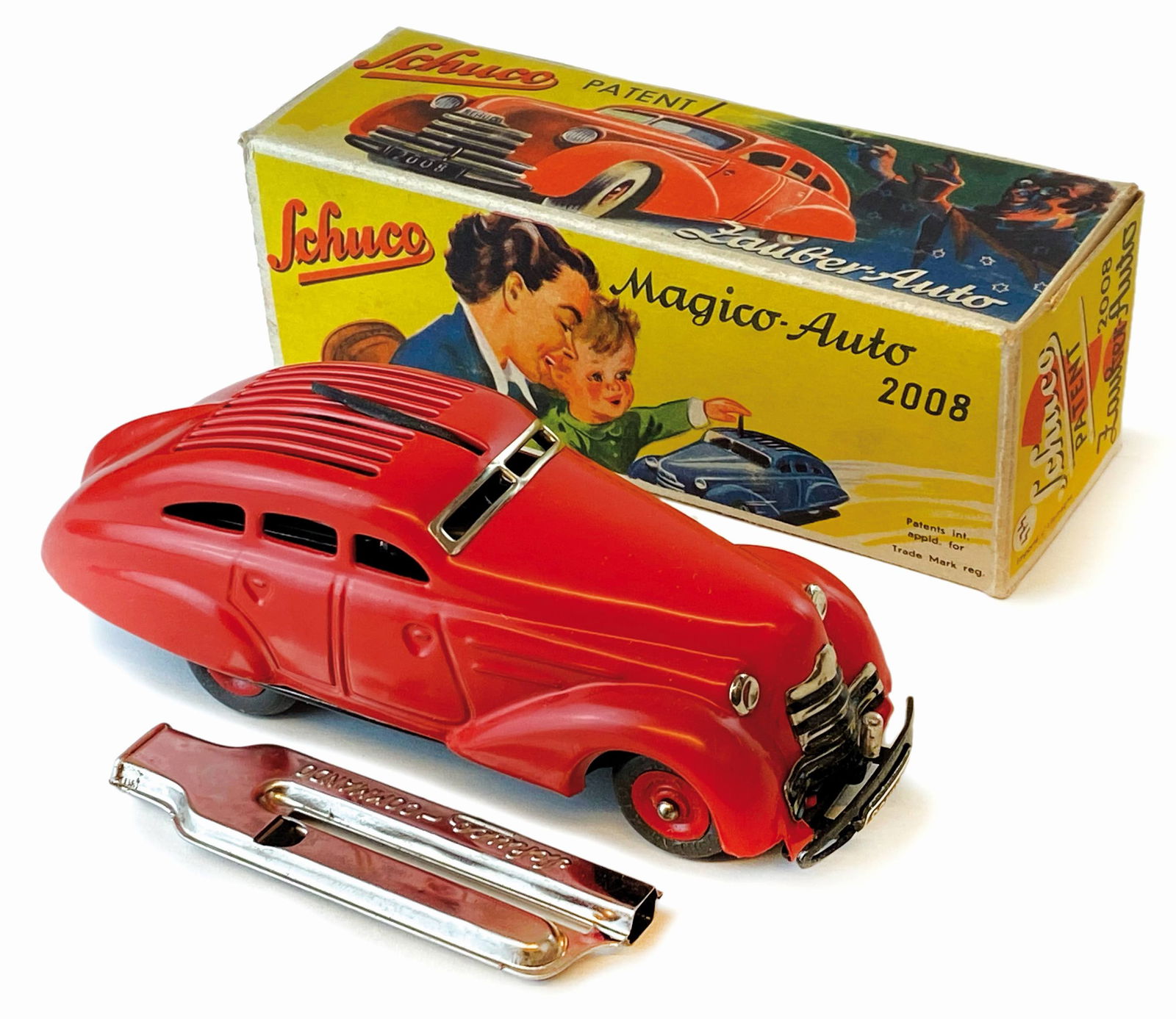 Schuco Patent Magico Auto 2008: Ditta Schuco, U.S - zone Germany; primo dopo­guerra. Latta litografata; cm 13,5x3,5x5. Meccani­smo a molla funzionante. Il meccanismo è attivato dallo spostamento d'aria che arriva sul tetto dell'a