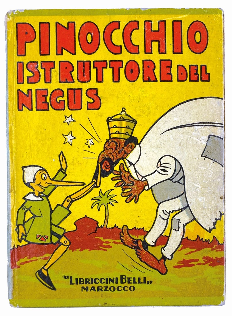 Pinocchio in Affrica - Istruttore del Negus: FAORZI; DE SETA - Cuccu'! Pinocchio in Affrica - Istruttore del Negus. Lotto composto da due volumi: Pinocchio in Affrica, Salani, collana I Librini del Cuccu', novembre 1940. Cartonatura sagomata, cm