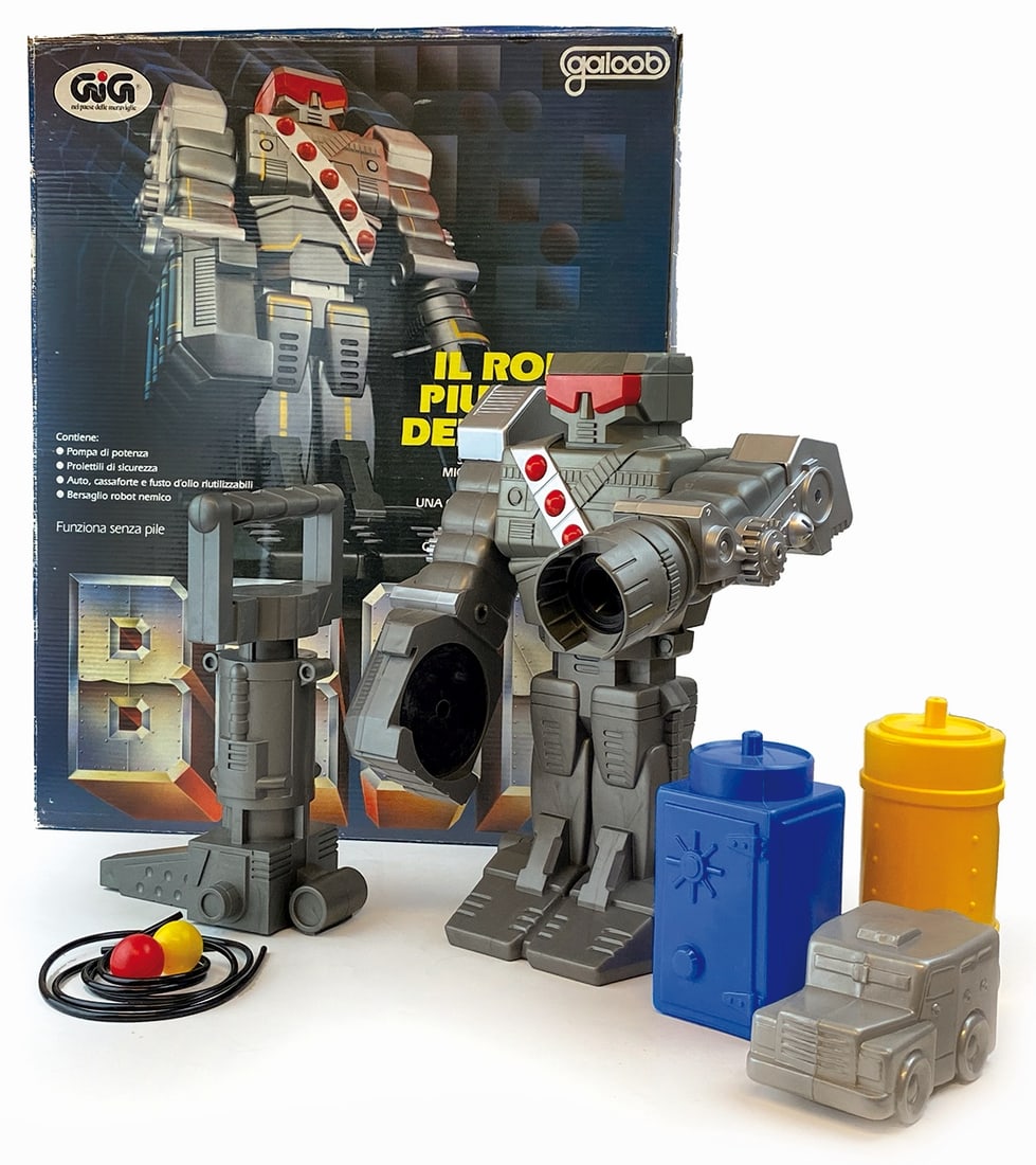 BRON IL ROBOT PIU’ FORTE DEL MONDO: Galoob per Gig, Italia, anni '90. In plastica, cm 30. Funzionante. Ottimo stato, completo di accessori, scatola originale in discreto stato. ENG Galoob for Gig, Italy, 1990s. In plastic, cm 30. Wor­k