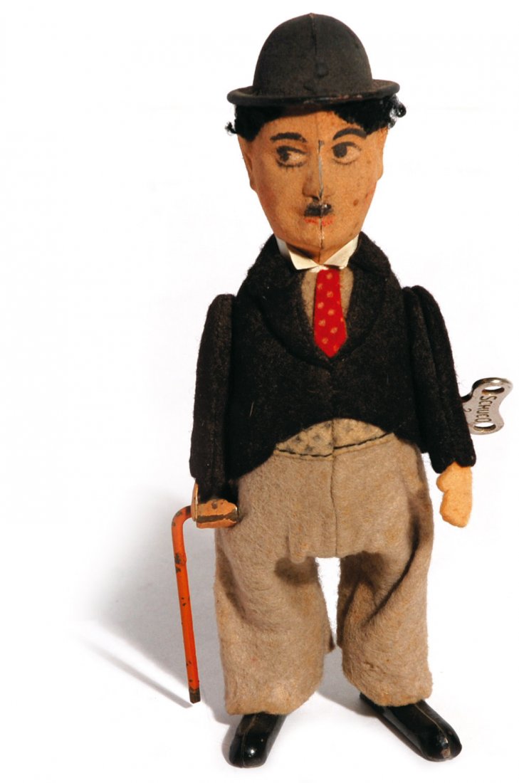 Charlot giocattolo a molla: ENG Schuco felt doll. Still operating. Very good condition. IT Charlot giocattolo a molla Schuco, anni ’20. Rivestito in panno lenci. Funzionante. Ottimo stato.